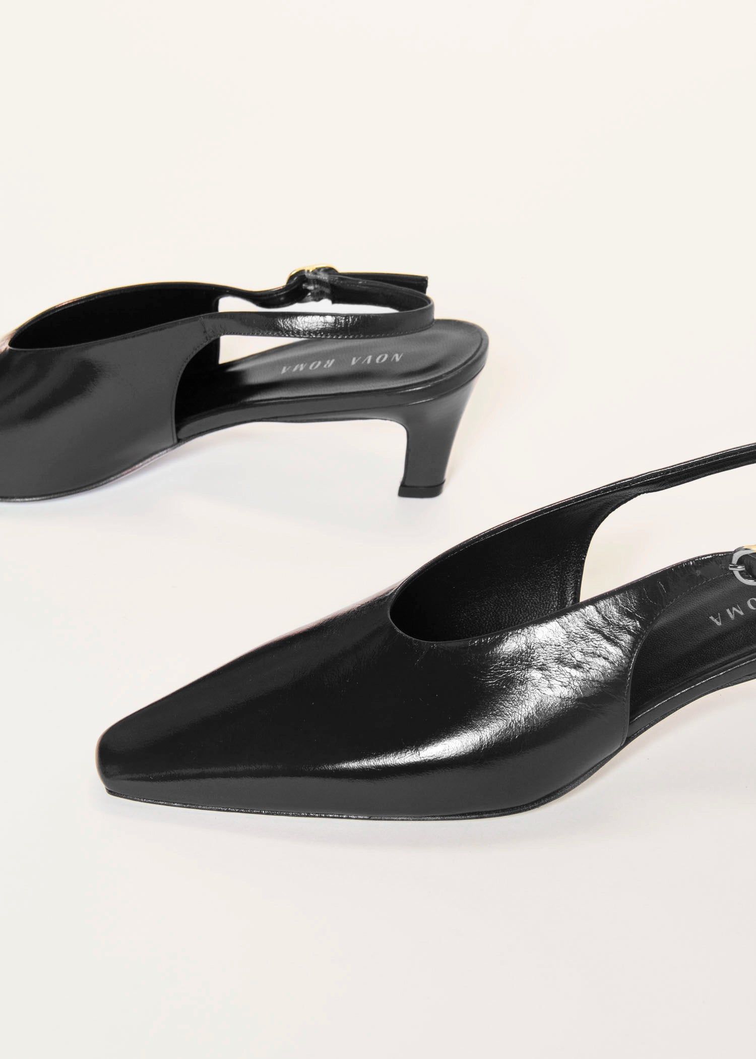 swatch_Black Patent slingback pump shoes