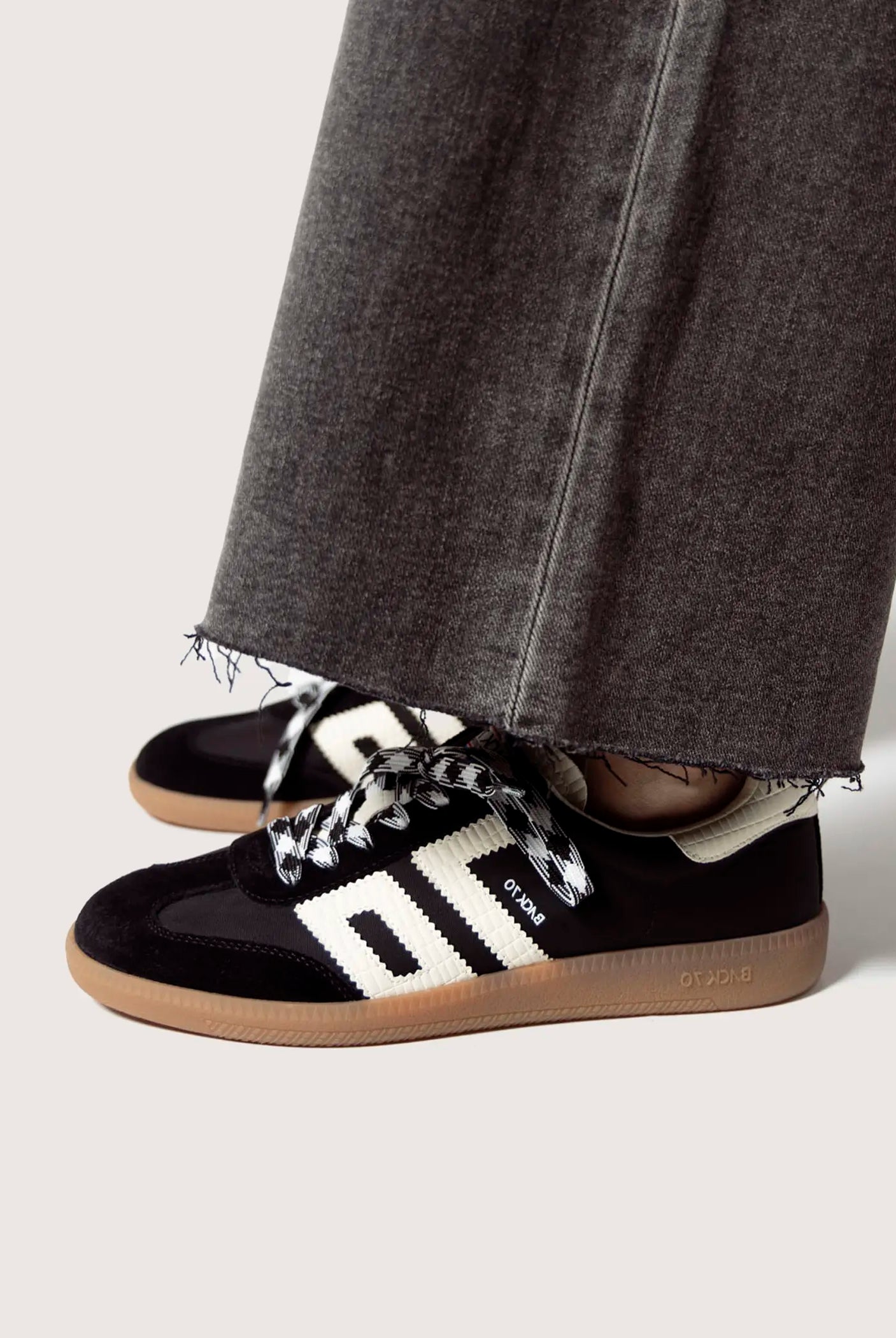 swatch_Black ghost sneakers