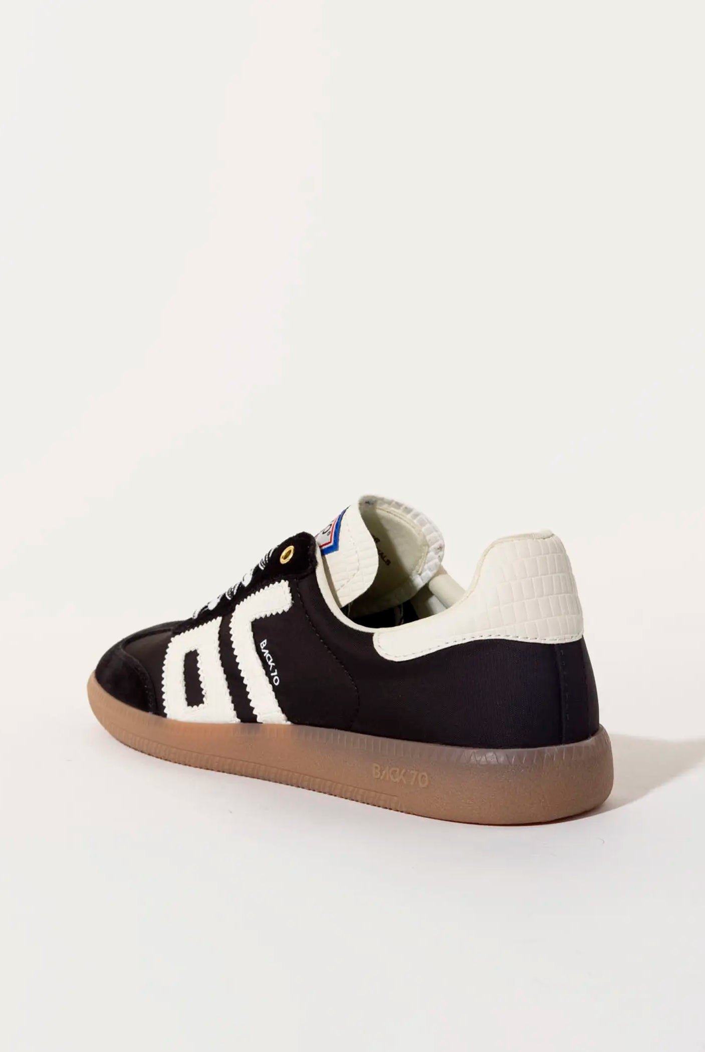 swatch_Black ghost sneakers