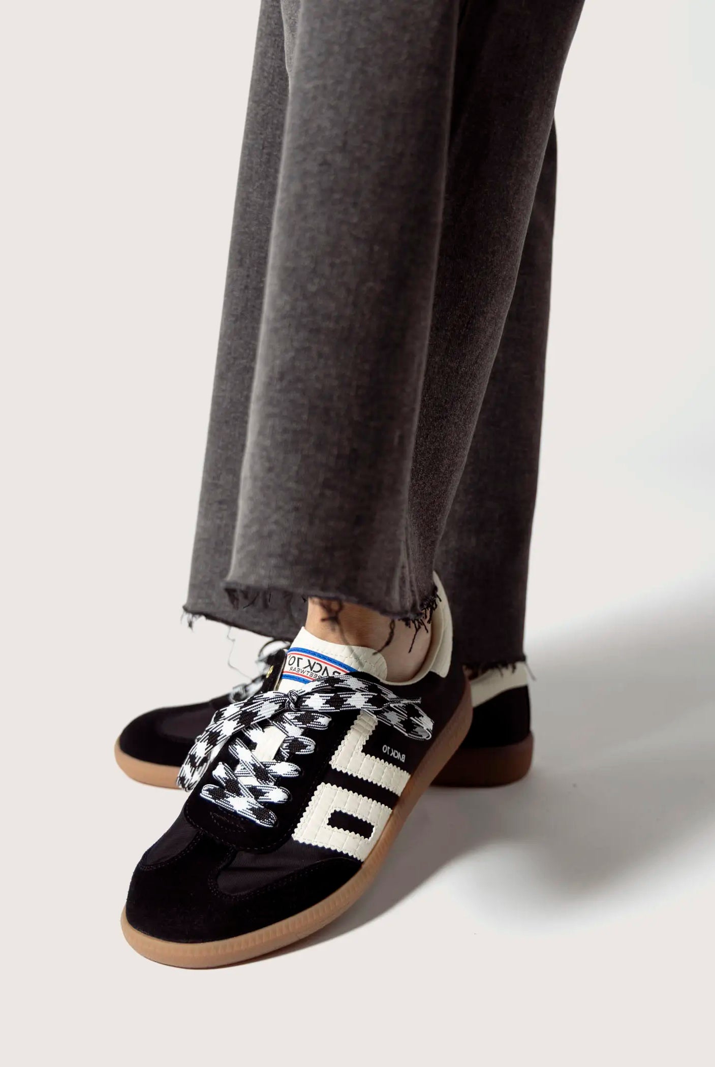 swatch_Black ghost sneakers