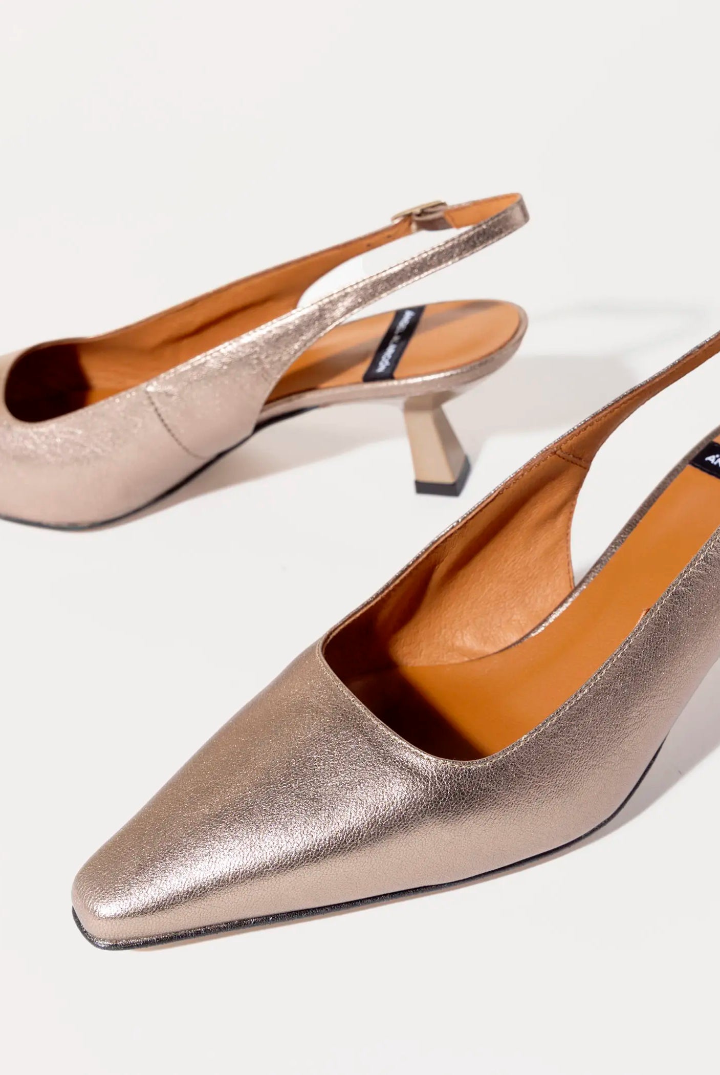 swatch_stone metallic slingback pump heels