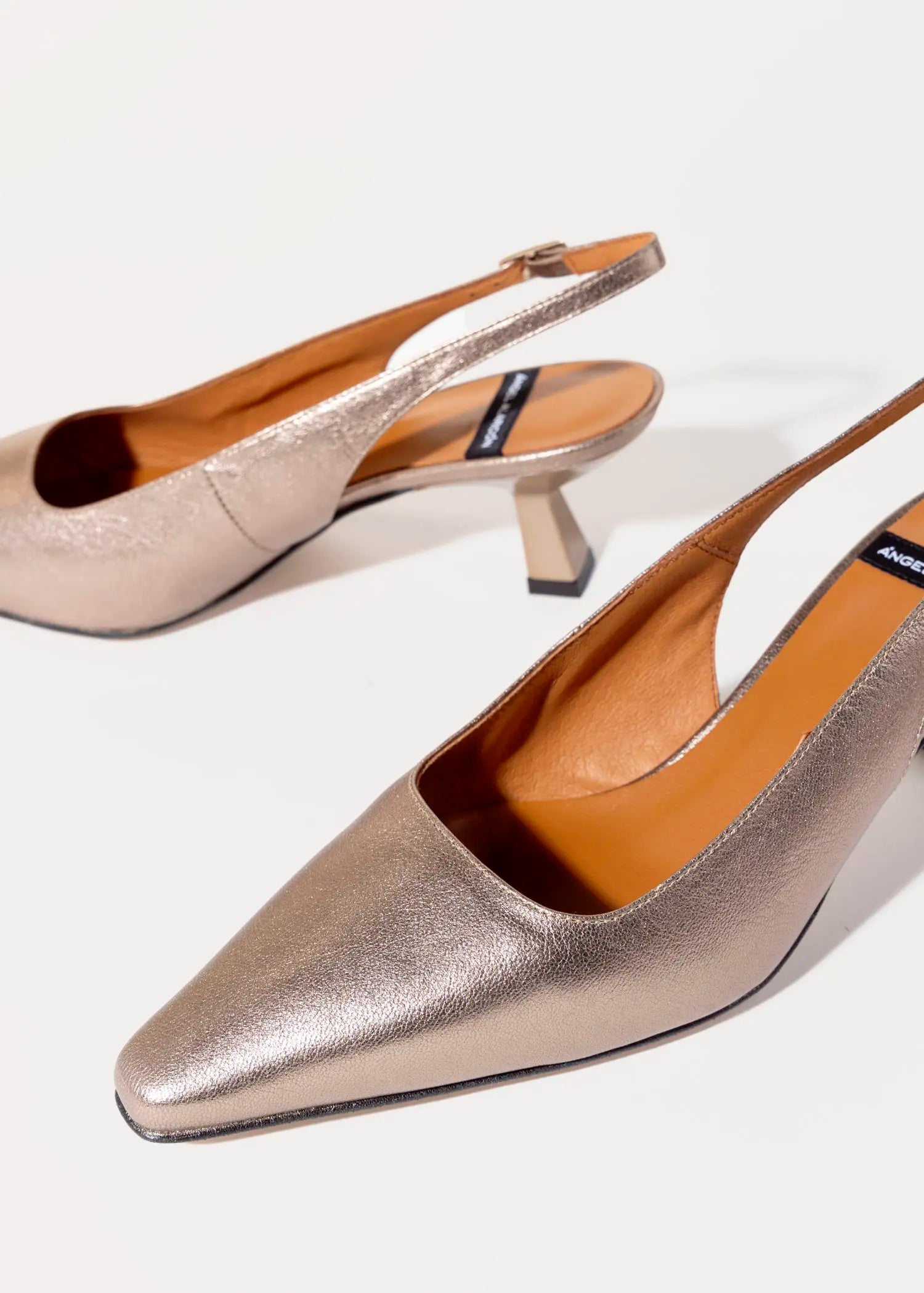 swatch_stone metallic slingback pump heels