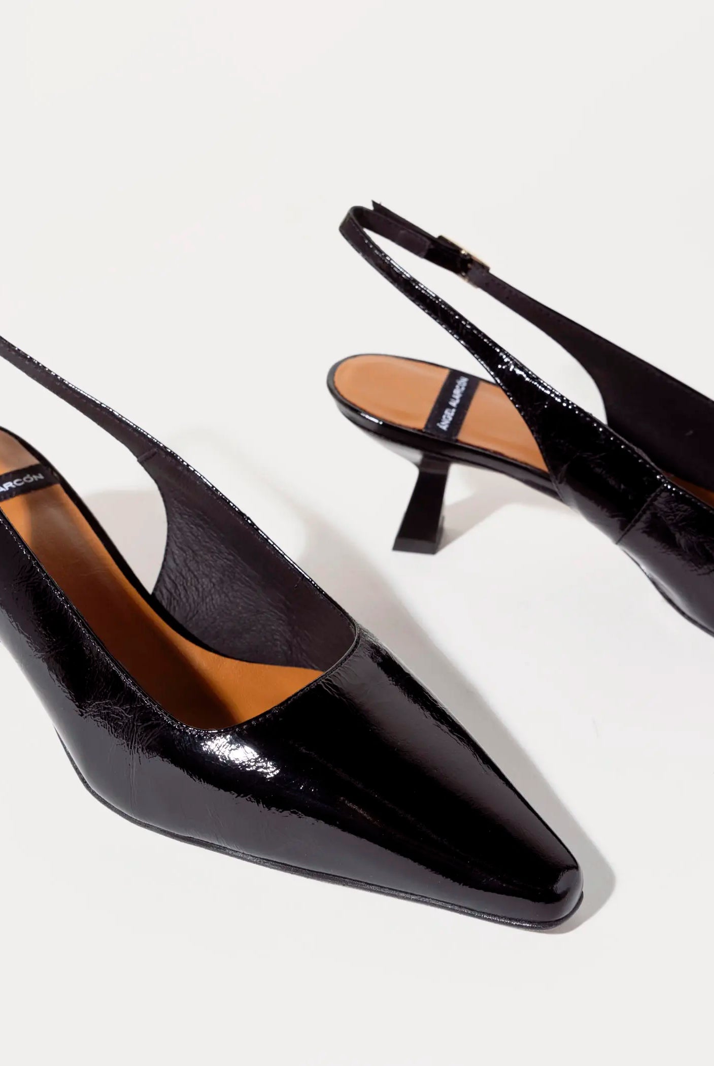swatch_black patent slingback pump heels