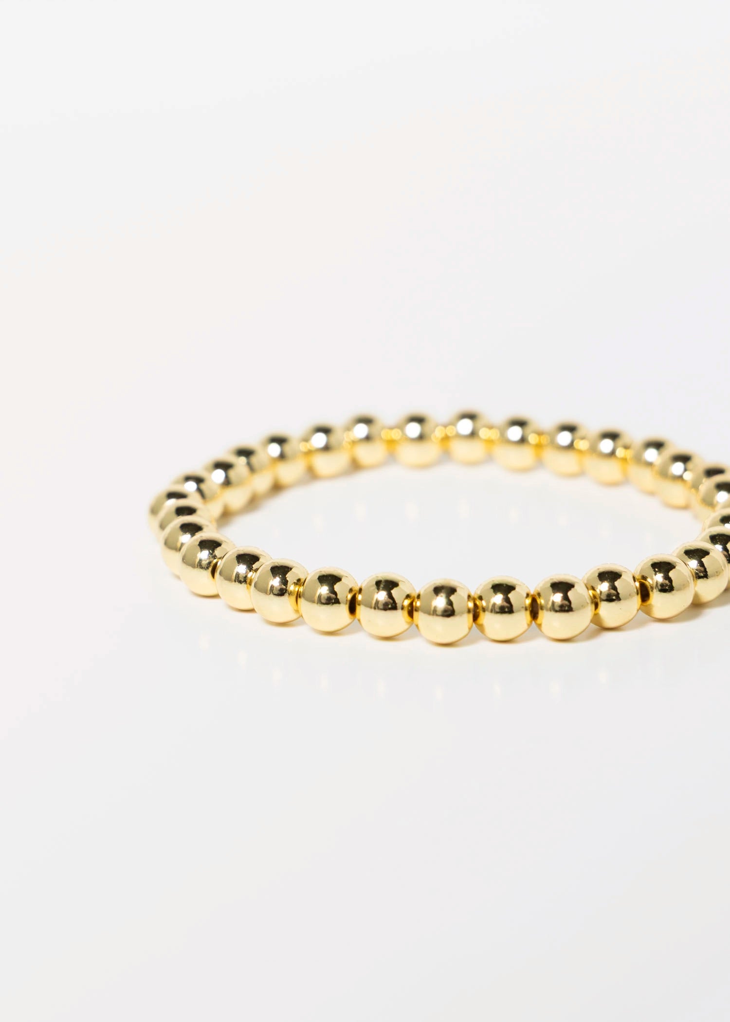 swatch_Gold beaded stretch bracelet