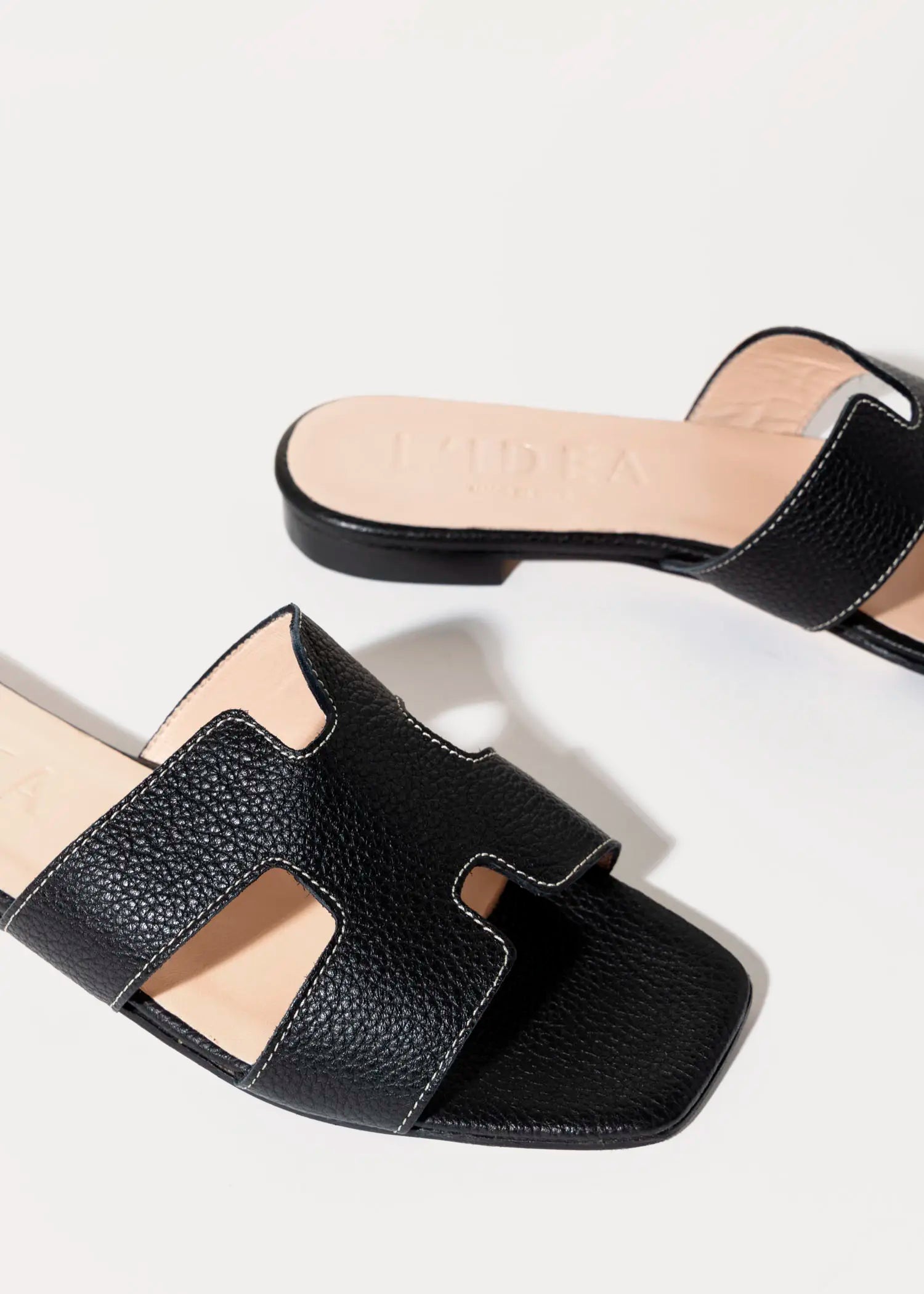 swatch_black leather leather cutout sandal flat sandals