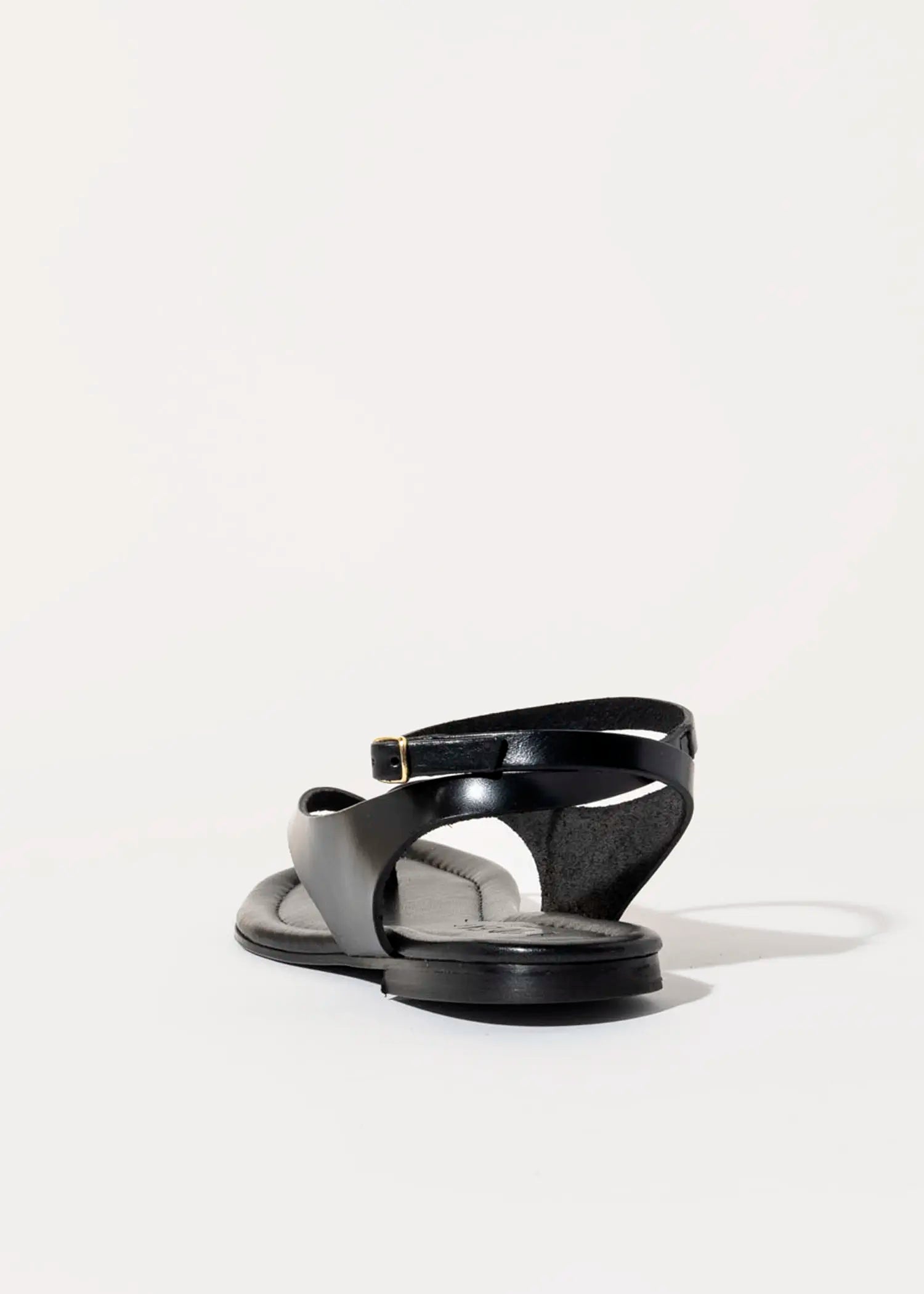 swatch_black leather flat thong sandal flat sandals