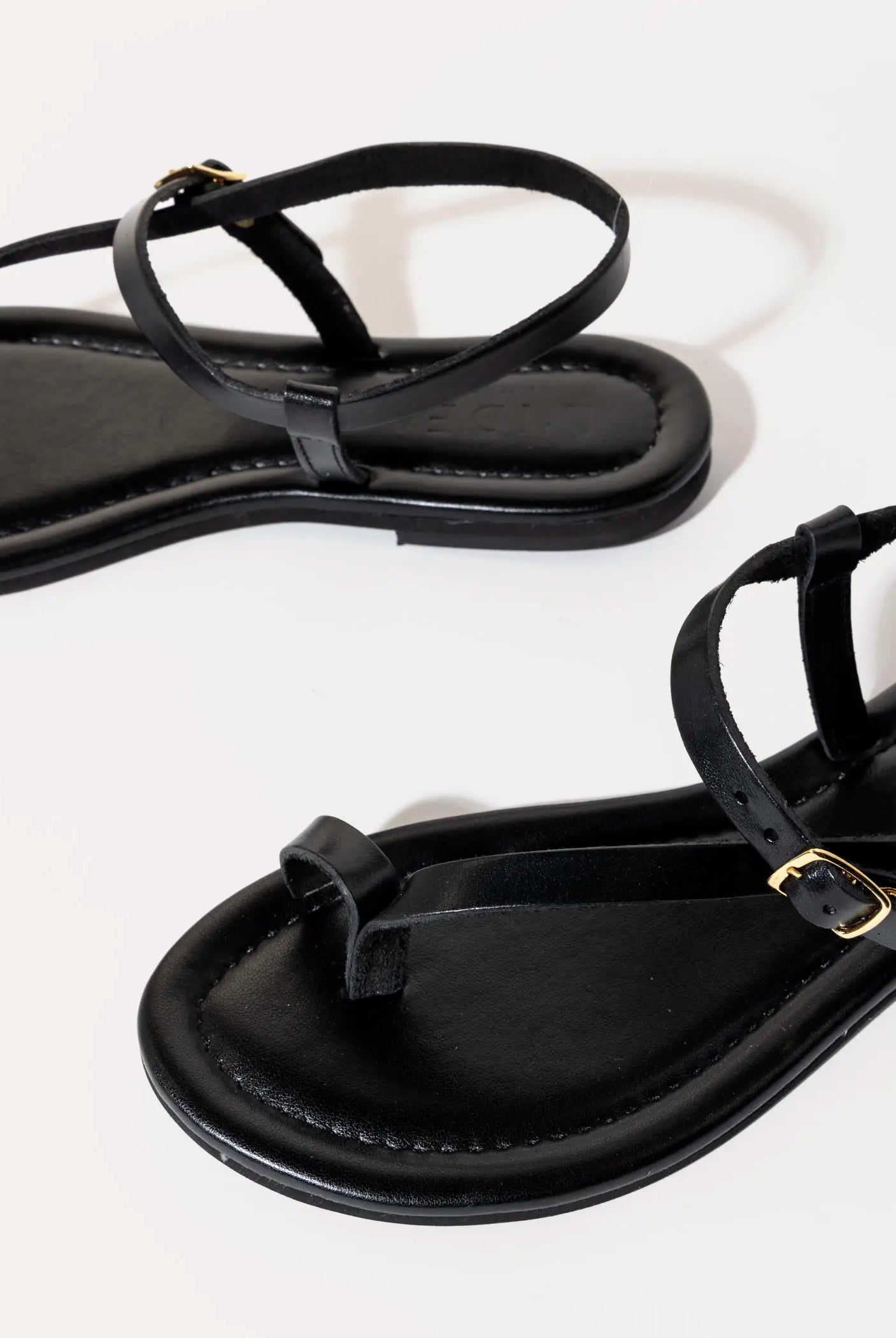 swatch_black leather strappy leather sandal flat sandals