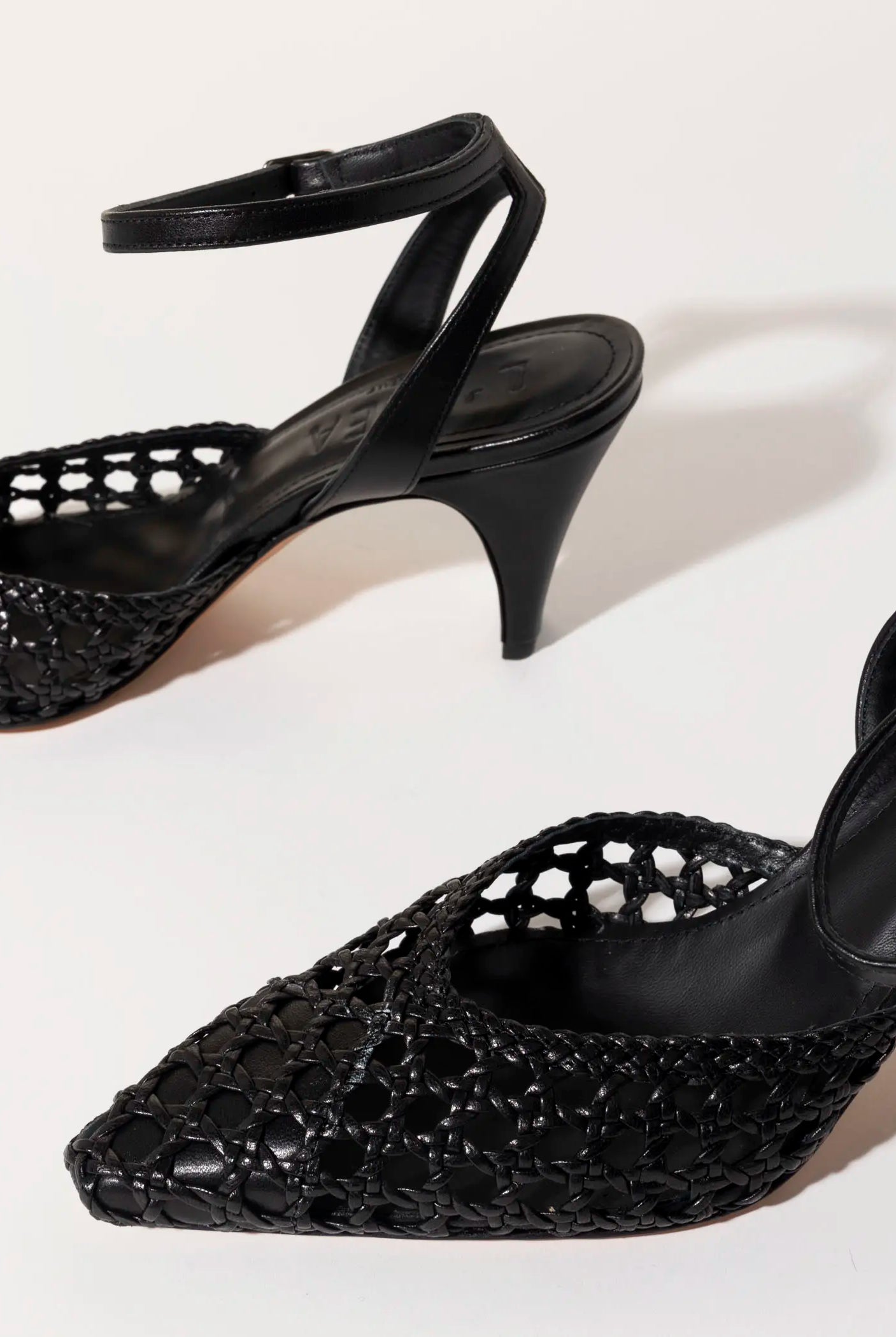 swatch_black leather livia two piece woven pump heels