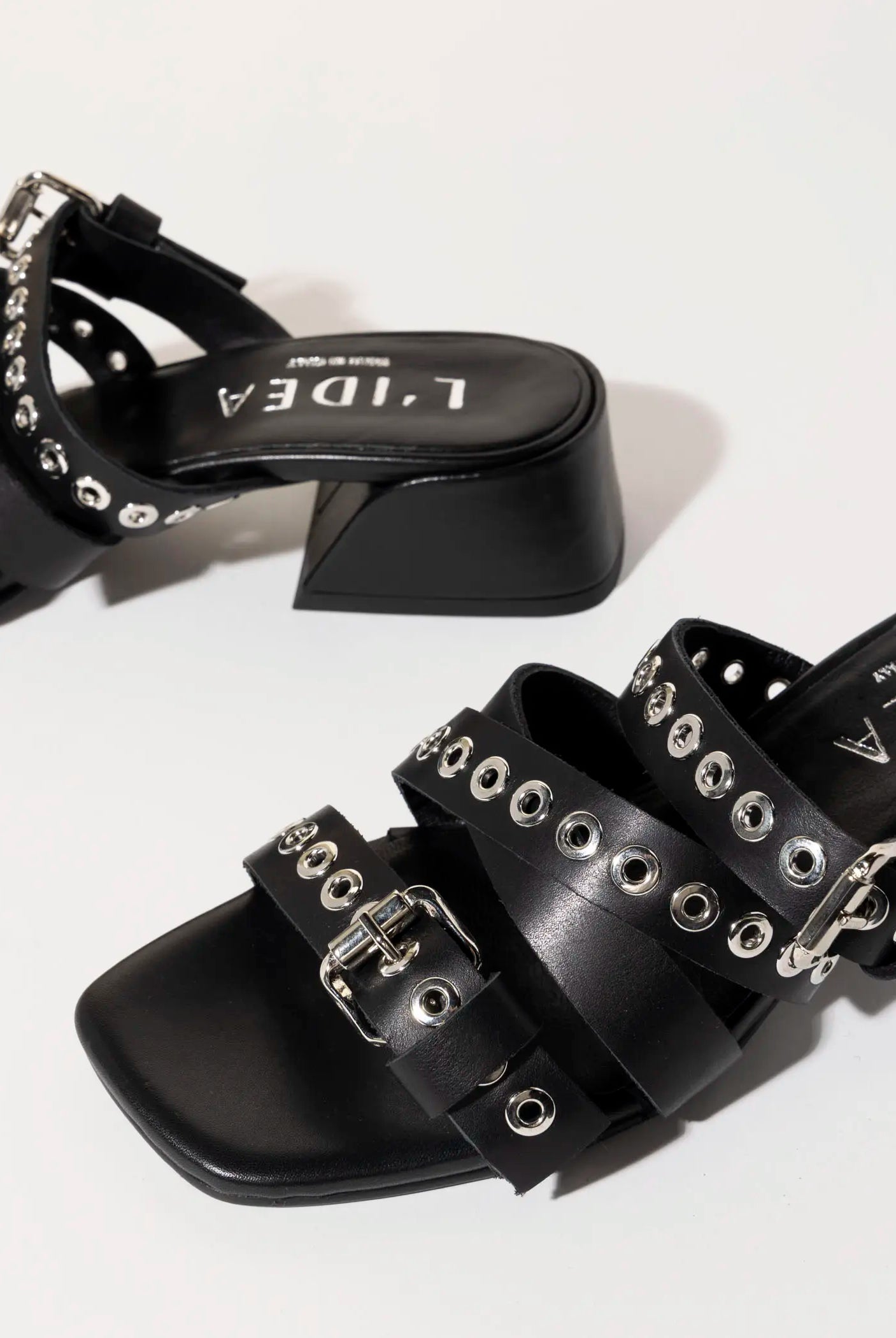 swatch_black leather heeled slide sandal heeled sandals