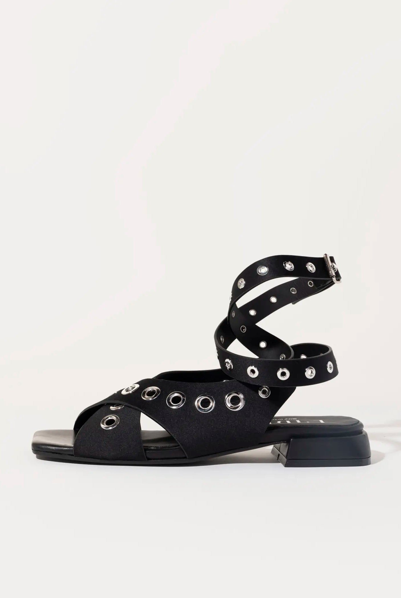 swatch_black satin flat sandal with grommets flat sandals