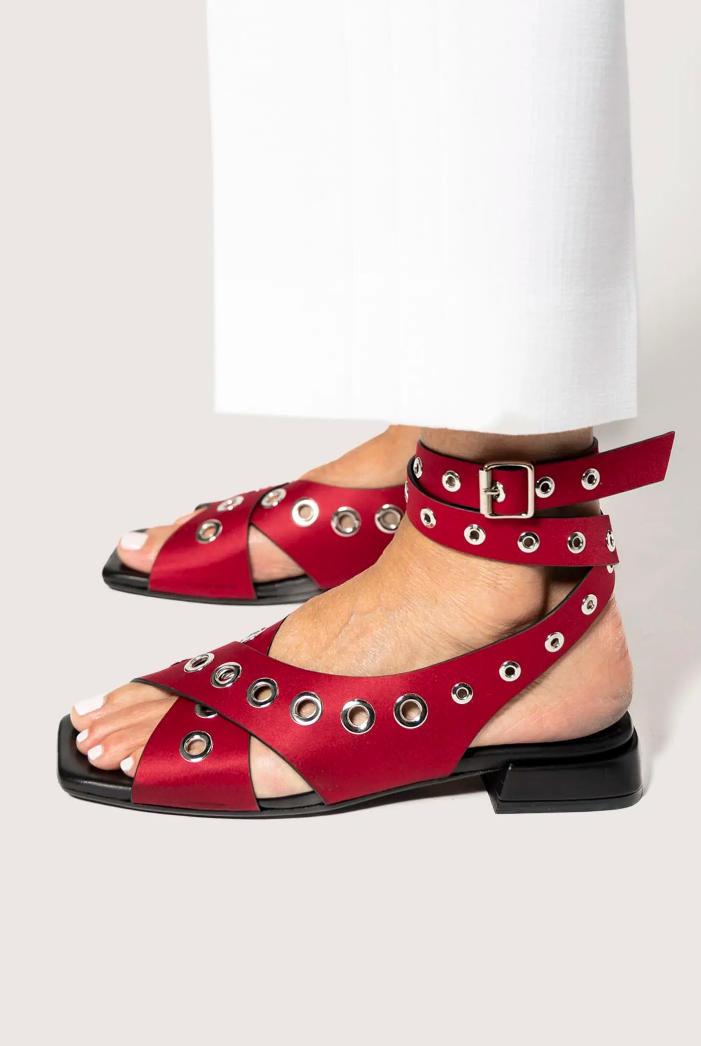 swatch_red satin flat sandal with grommets flat sandals
