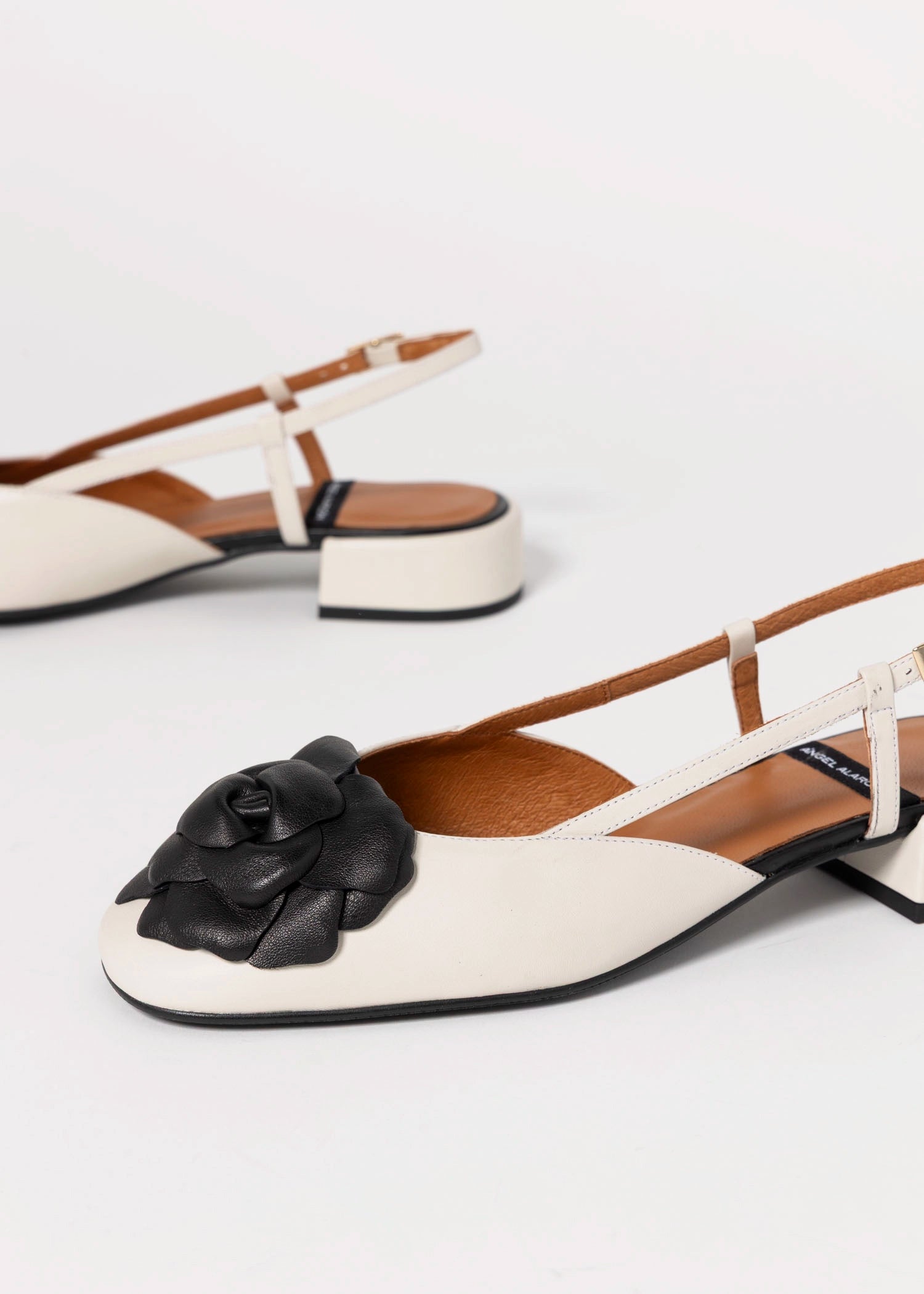 swatch_Ivory/Black florence leather slingback angel alarcon
