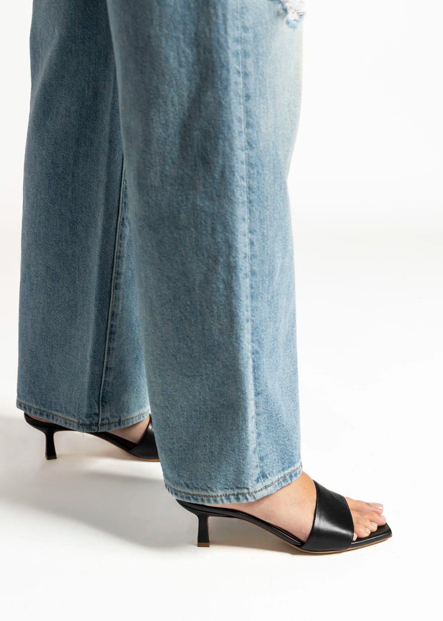 swatch_black leather slide sandal heeled sandals