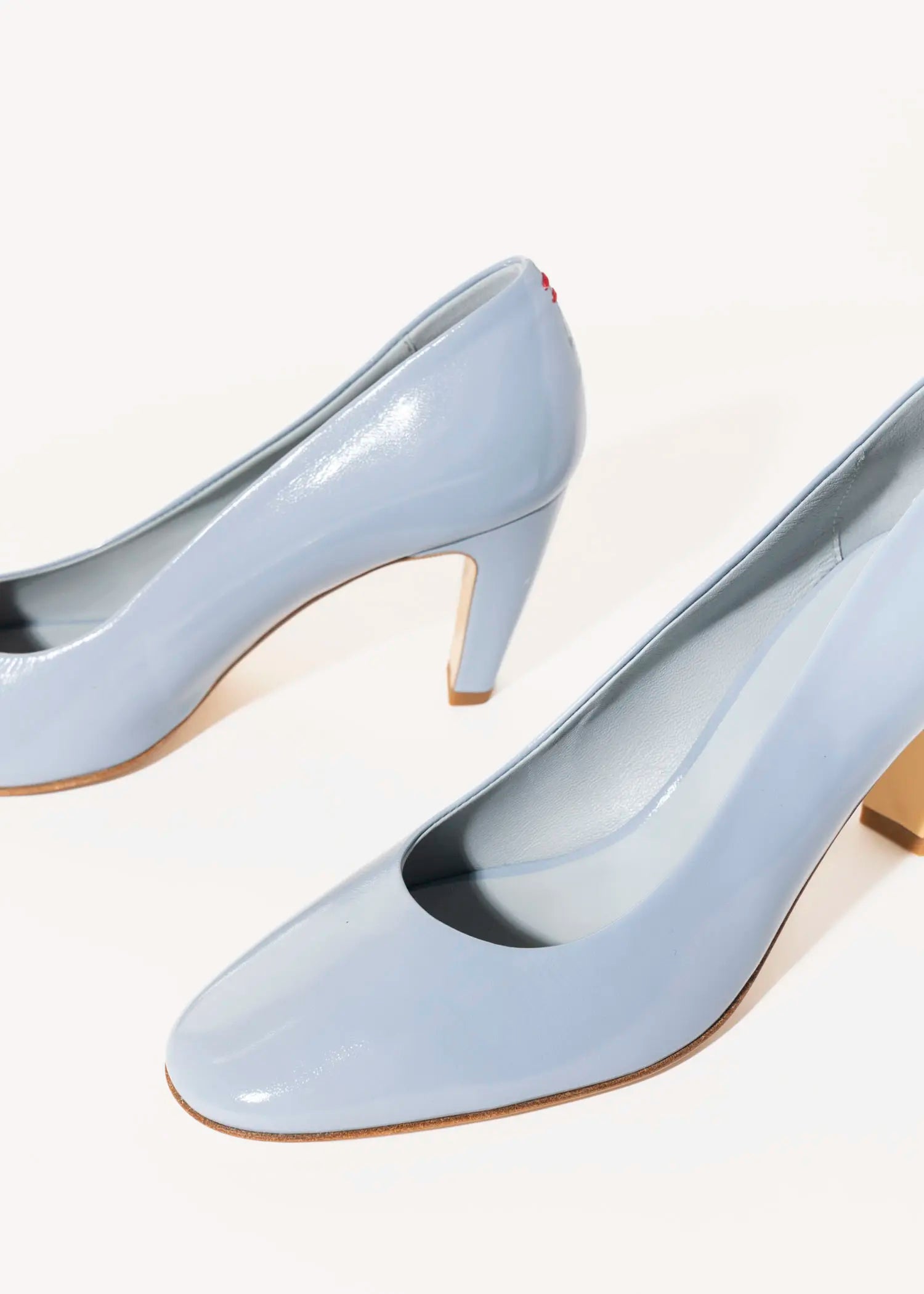 swatch_light blue patent dora round toe pump heels
