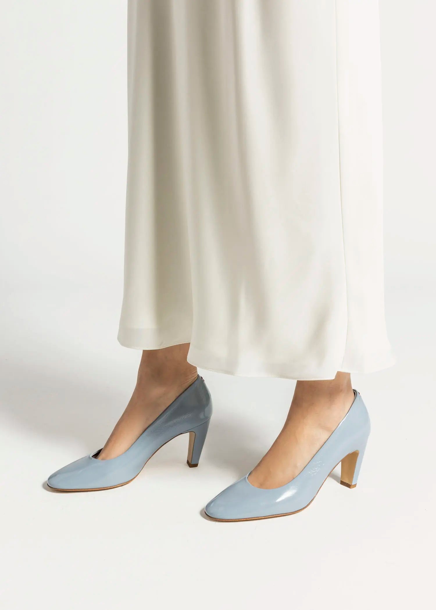 swatch_light blue patent dora round toe pump heels