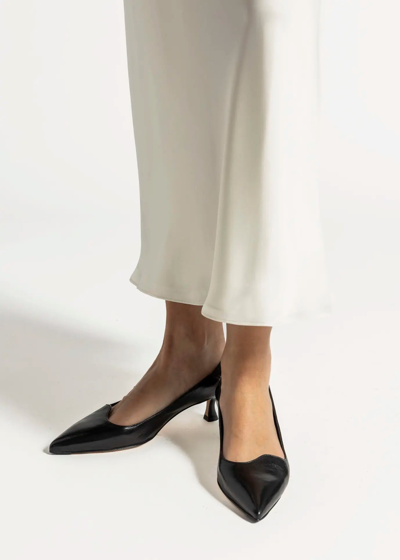 swatch_black leather leather slingback pump heels