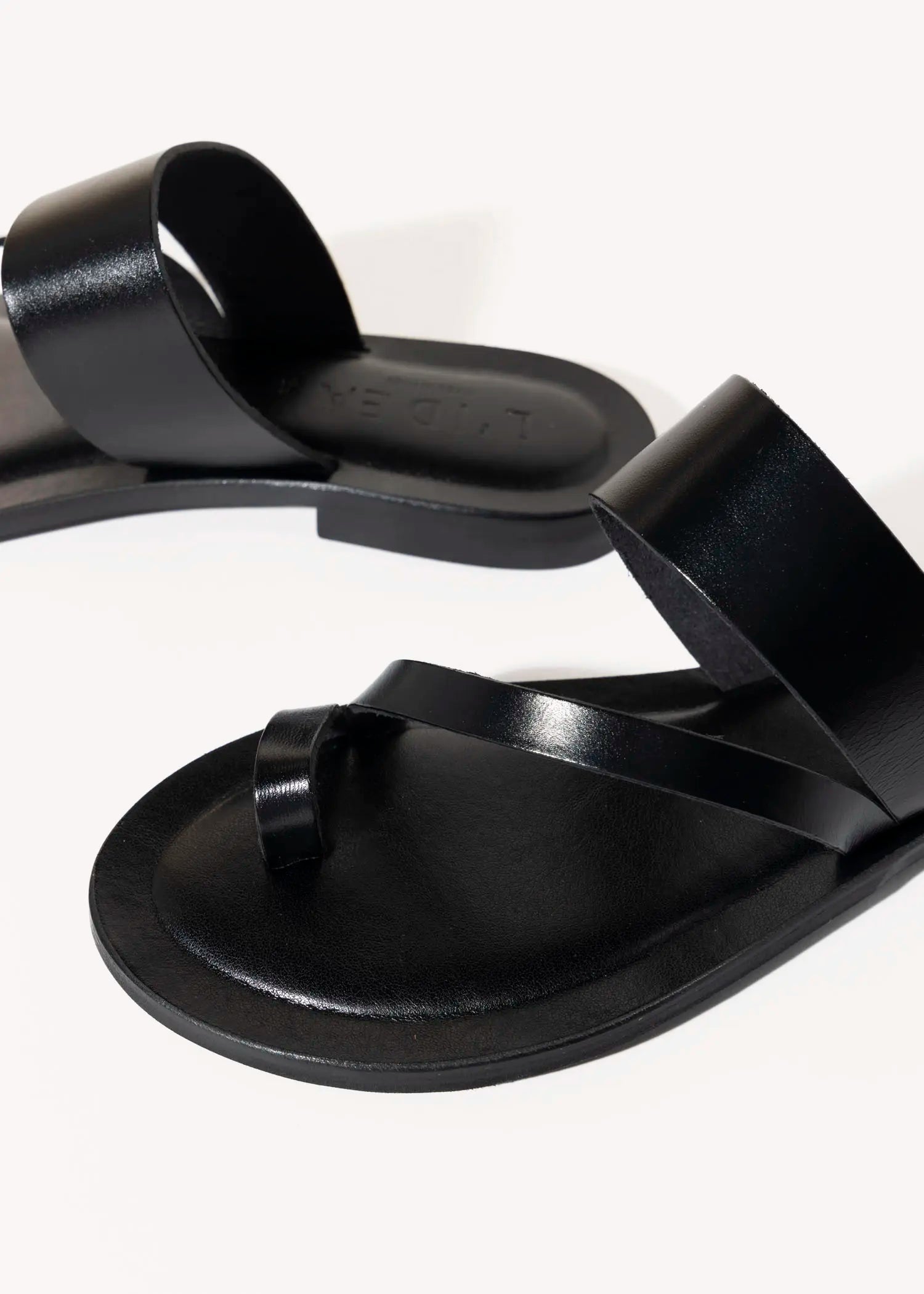swatch_black leather leather toe ring sandal flat sandals