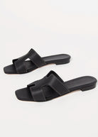 swatch_black leather leather cutout sandal flat sandals