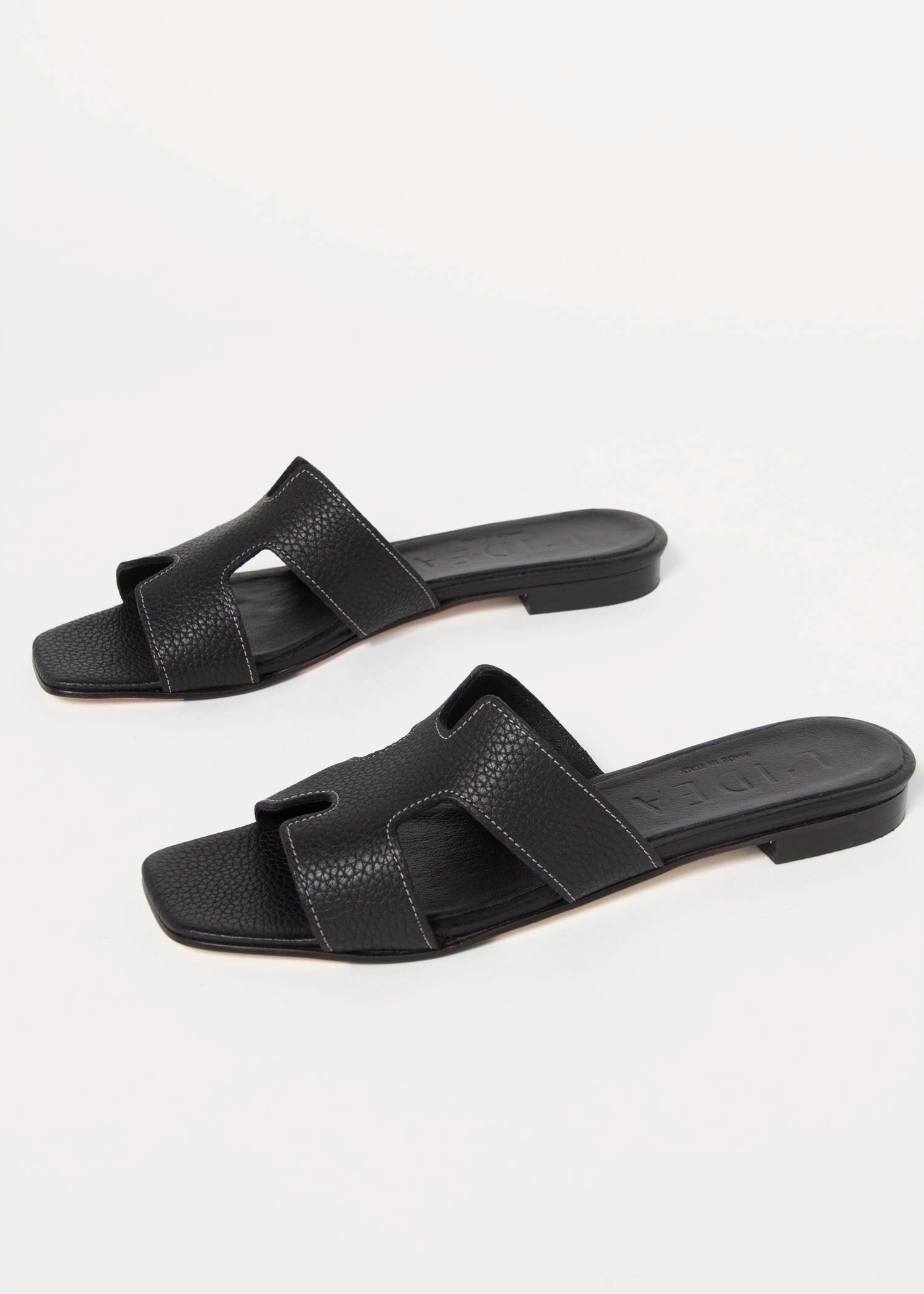swatch_black leather leather cutout sandal flat sandals