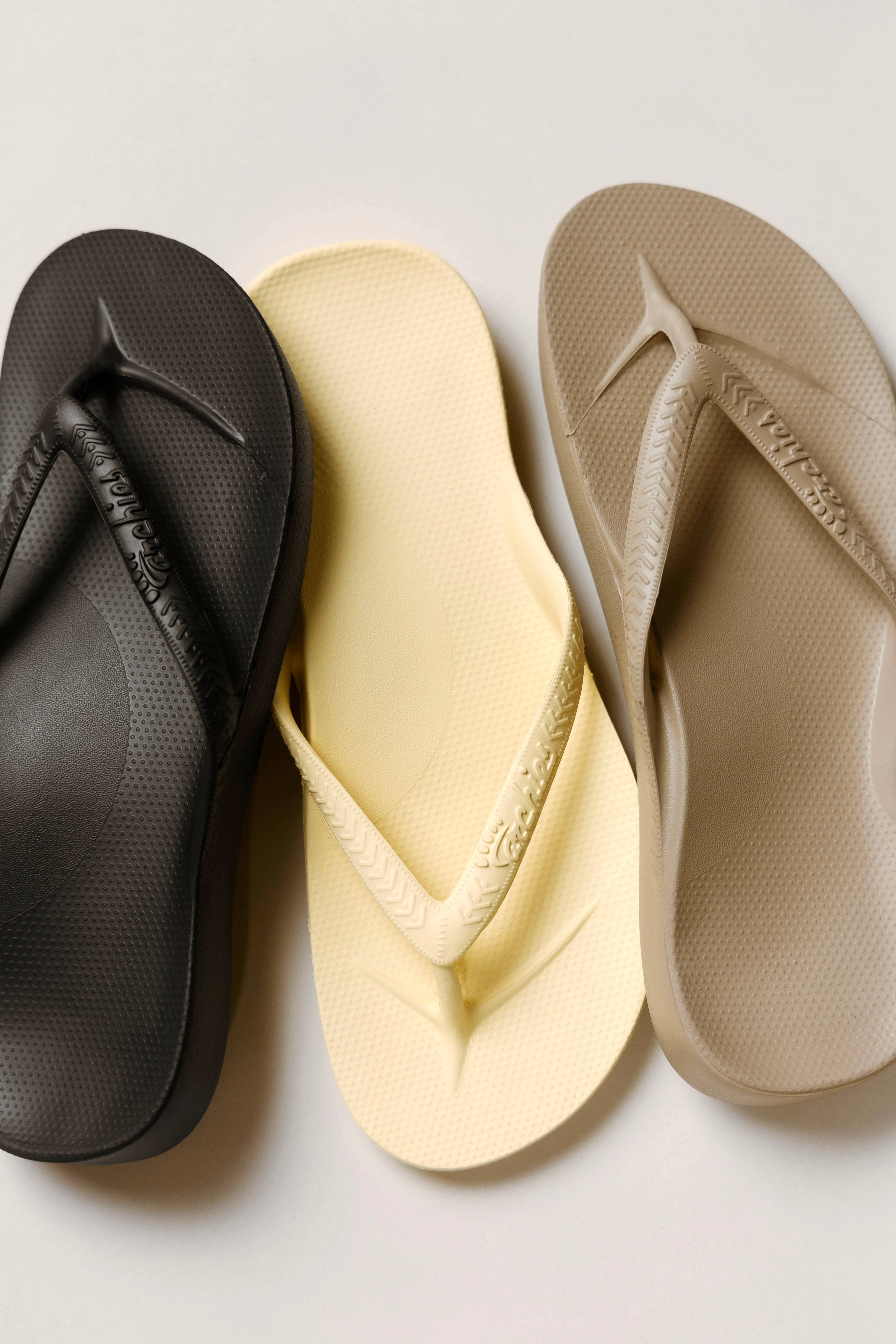 picture of three flip flops with link to shop all archies shoes