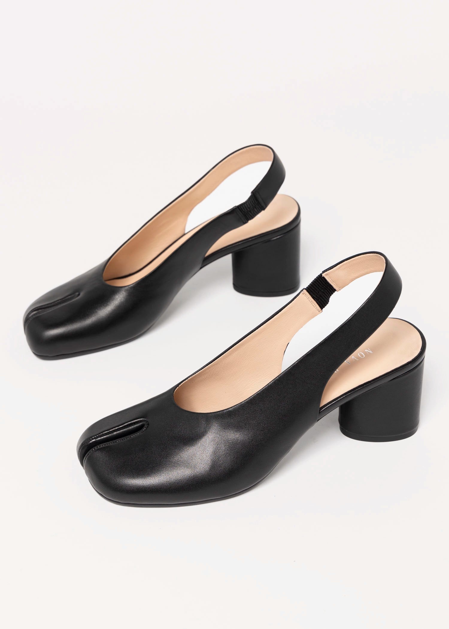 swatch_Black Leather tabi slingback pump