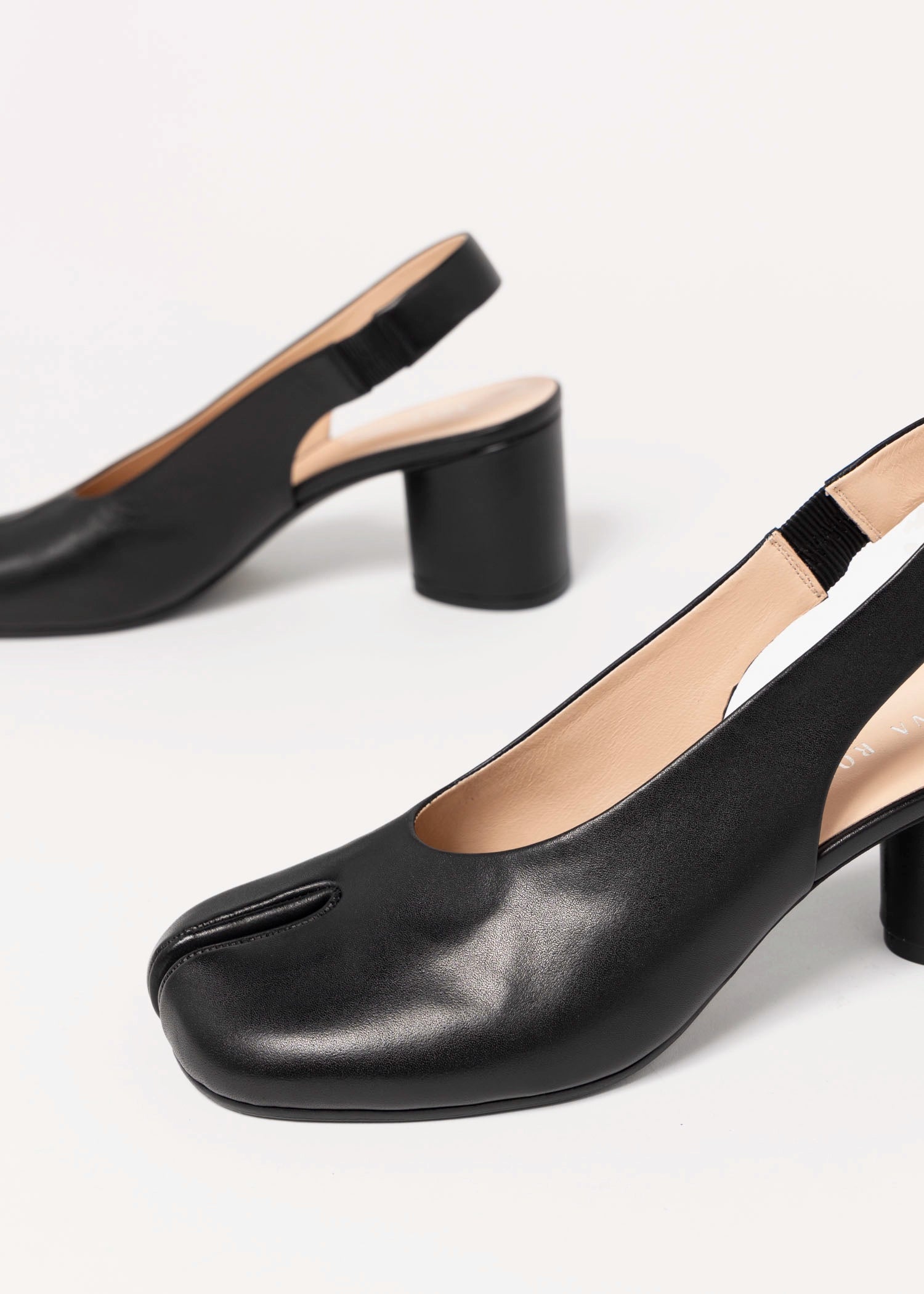 swatch_Black Leather tabi slingback pump