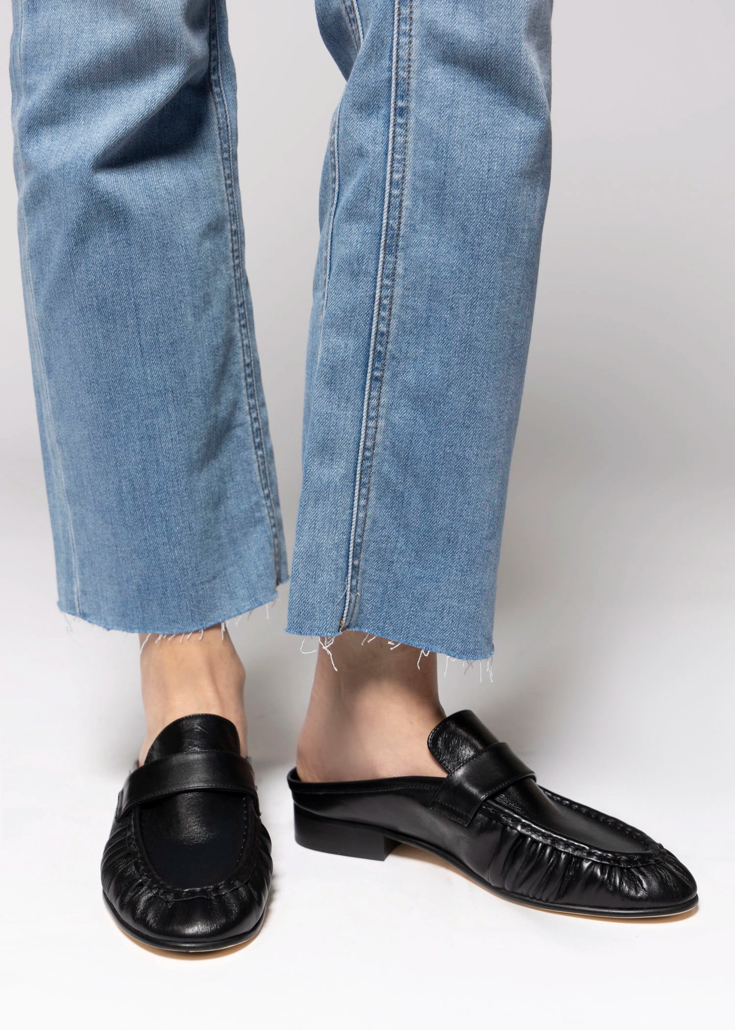 swatch_Black Leather tony bianco glacier ruched mule loafer