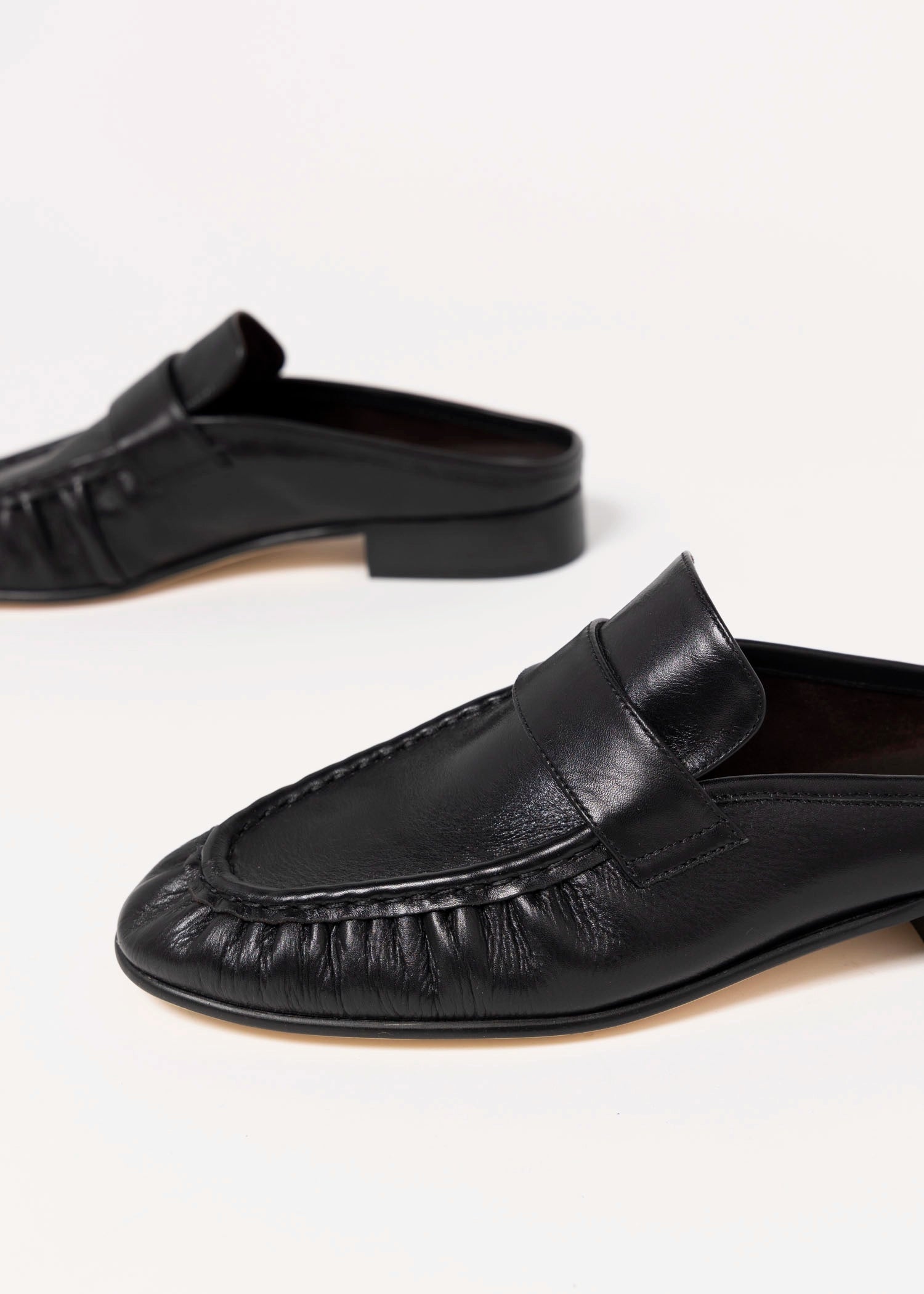 swatch_Black Leather tony bianco glacier ruched mule loafer