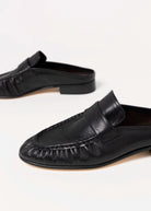 swatch_Black Leather tony bianco glacier ruched mule loafer