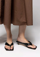 swatch_Black Leather Tony Bianco tropic heeled thong