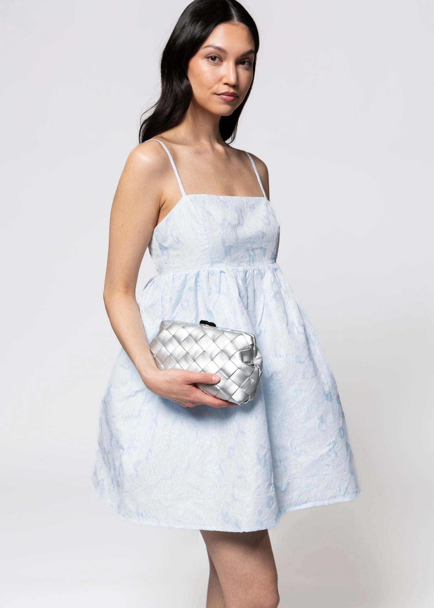 swatch_Silver olga berg quinn woven leather clutch