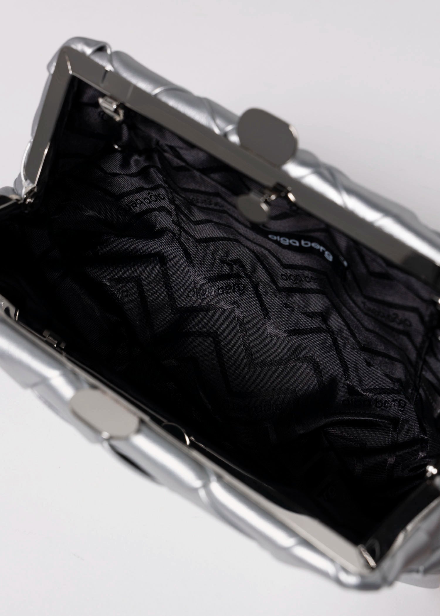 swatch_Silver olga berg quinn woven leather clutch