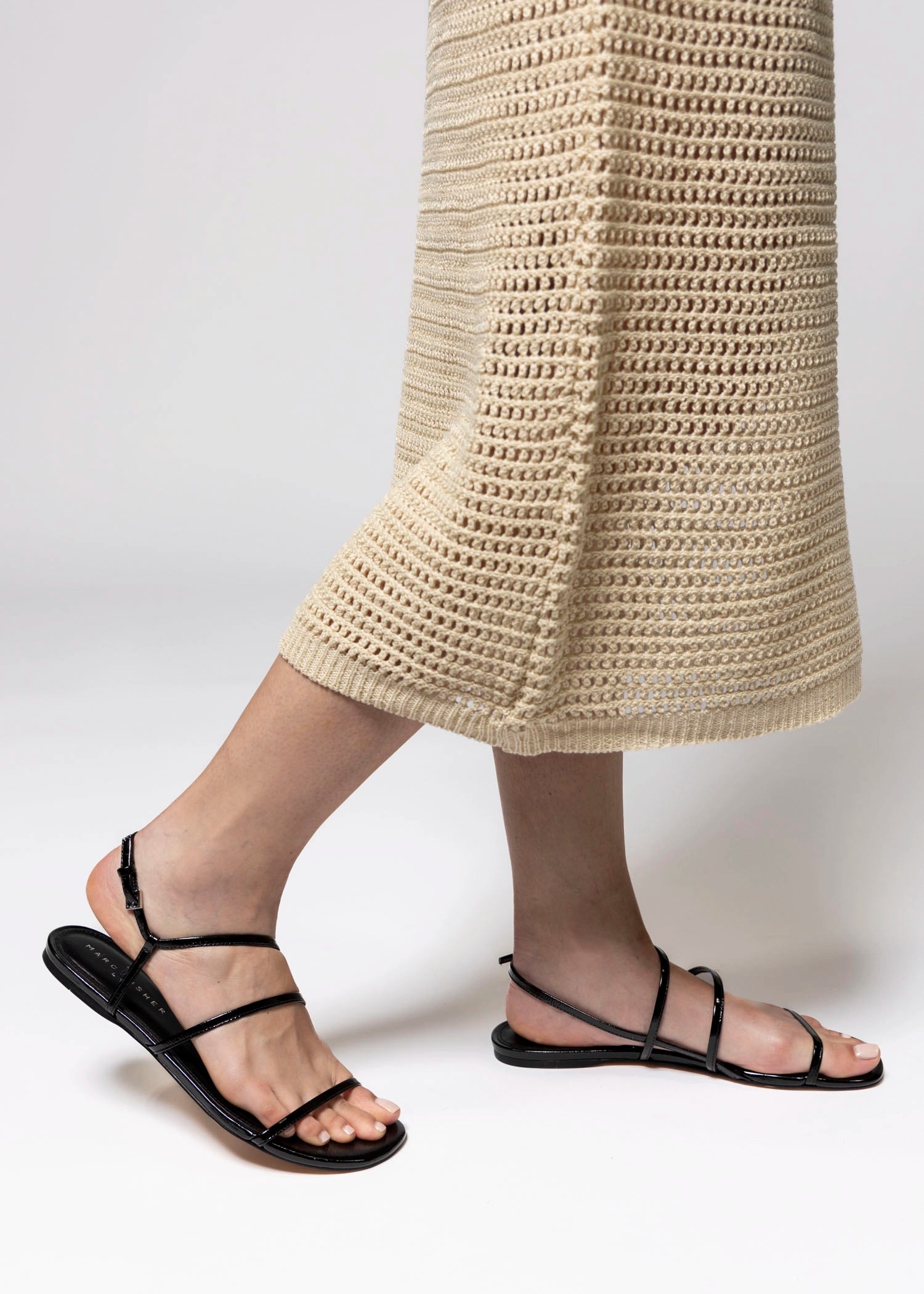 swatch_Black Leather marc fisher elysha flat sandal