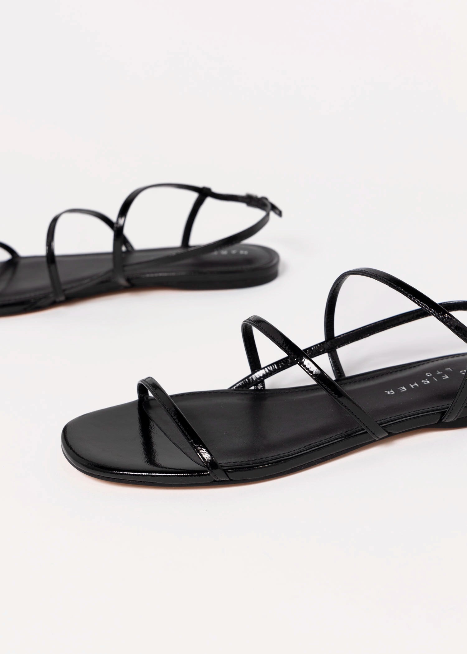 swatch_Black Leather marc fisher elysha flat sandal