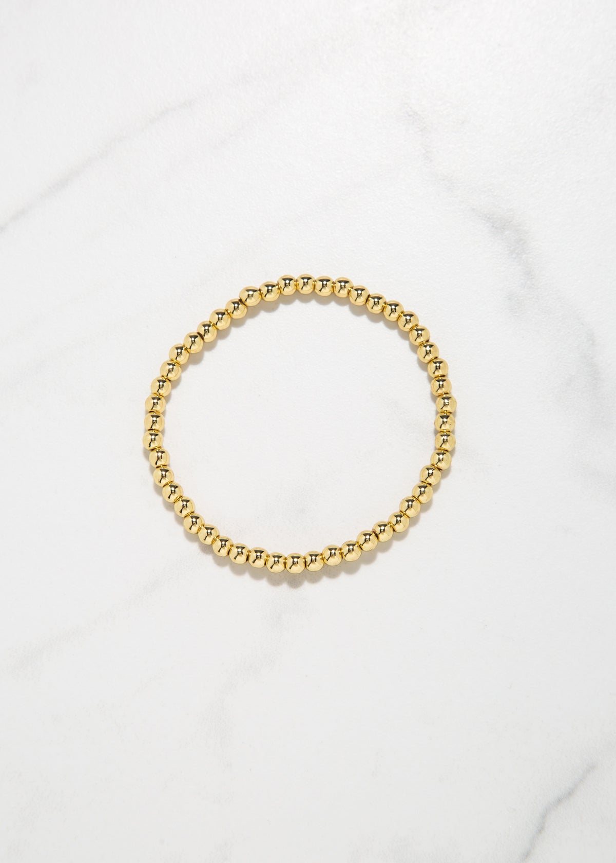 swatch_gold small beaded stretch bracelet accessories