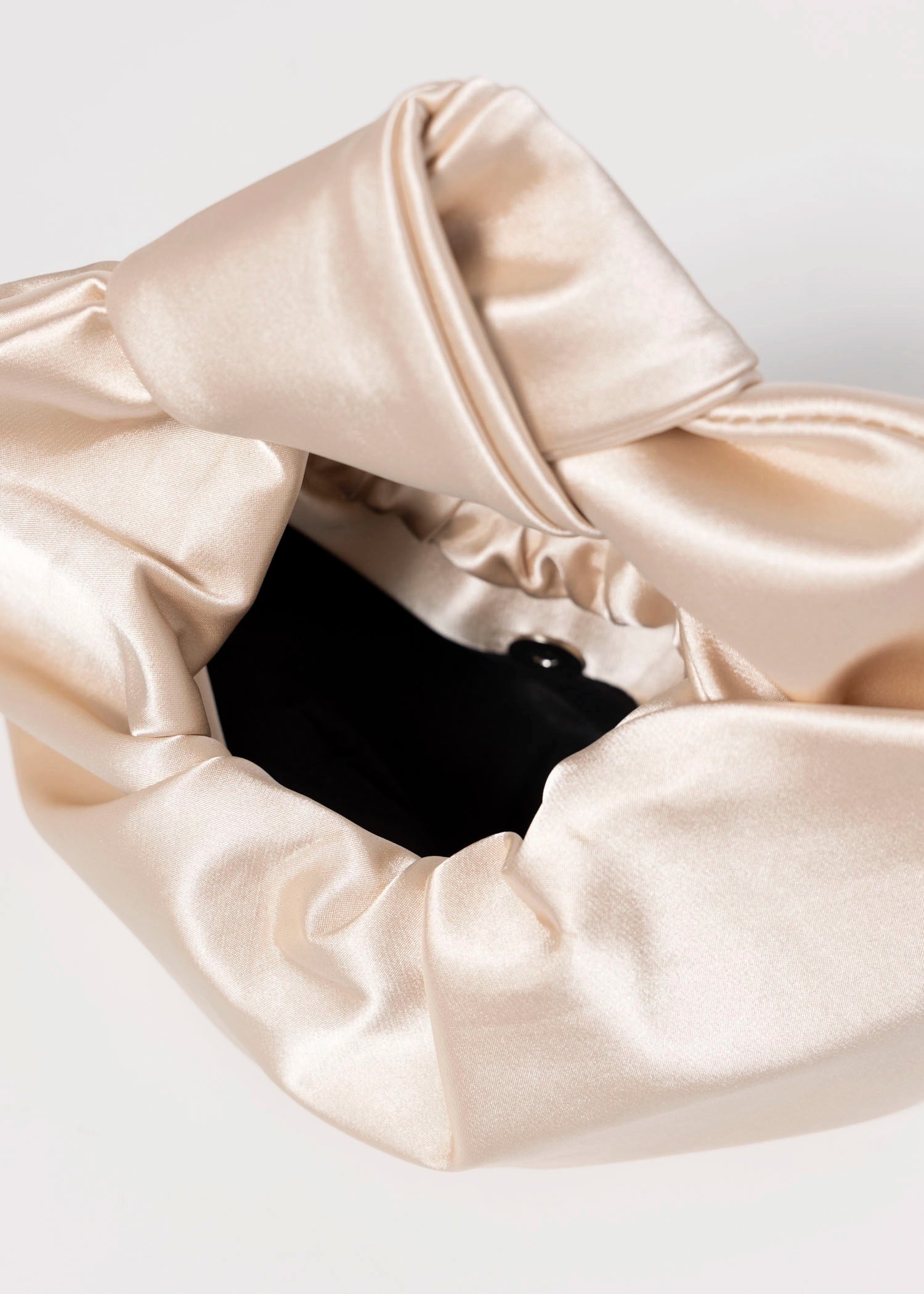 swatch_Champagne satin knot evening bag