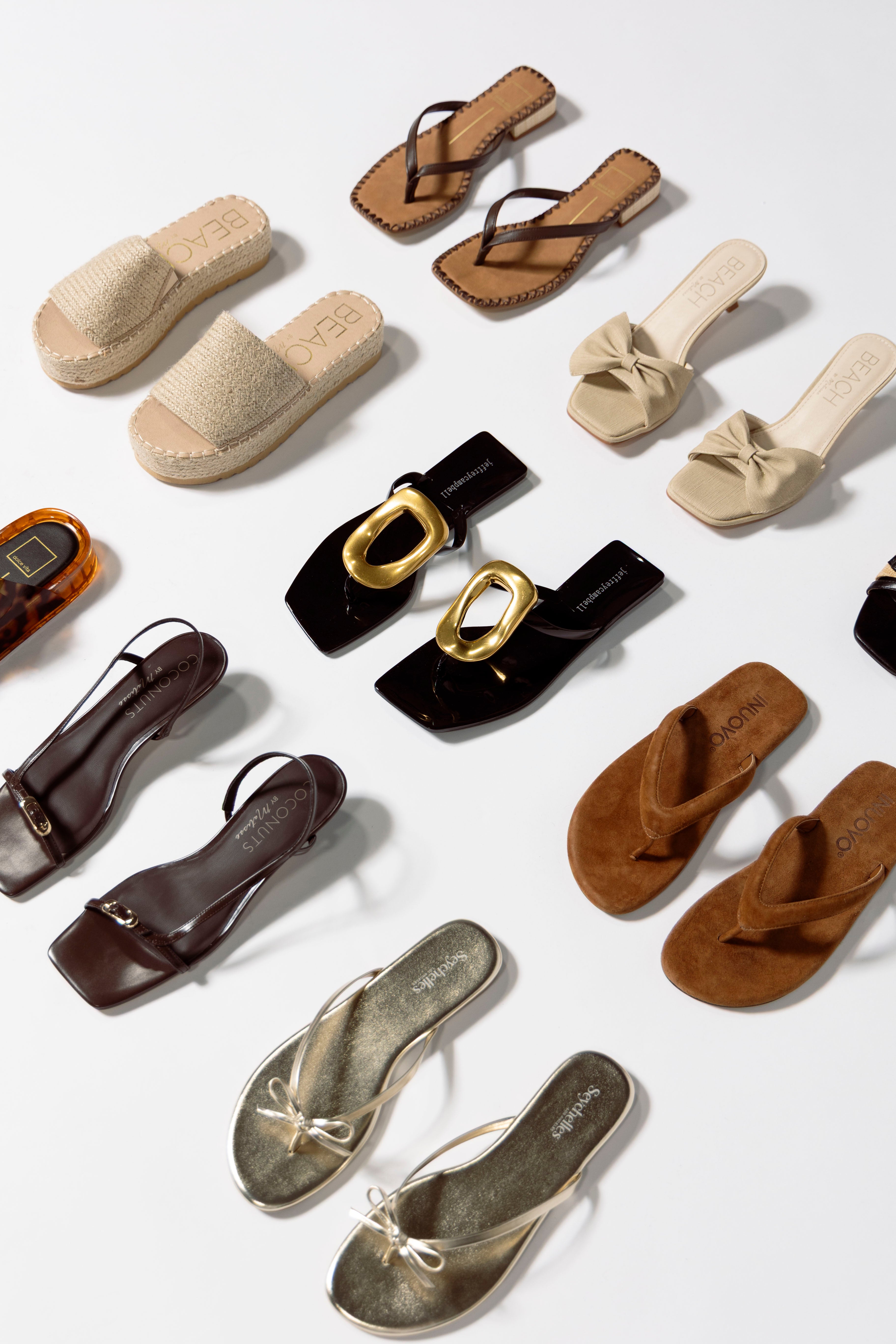 picture of multiple sandals with a link to shop sandals under $100 collection