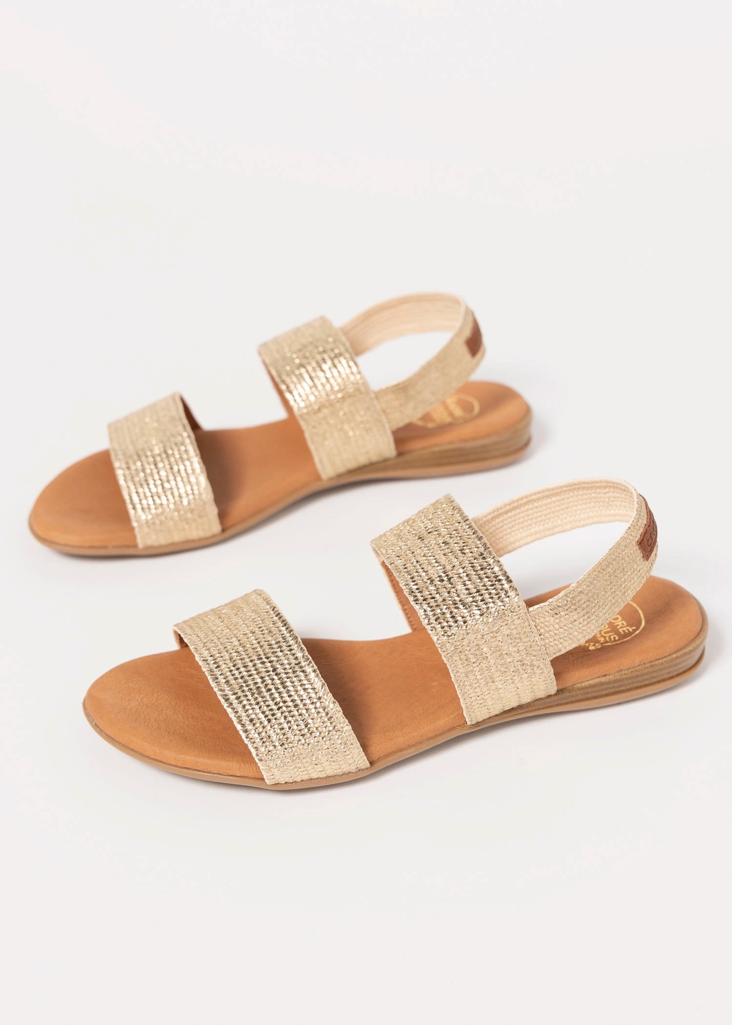 swatch_Platino andre assous nigella woven sandal