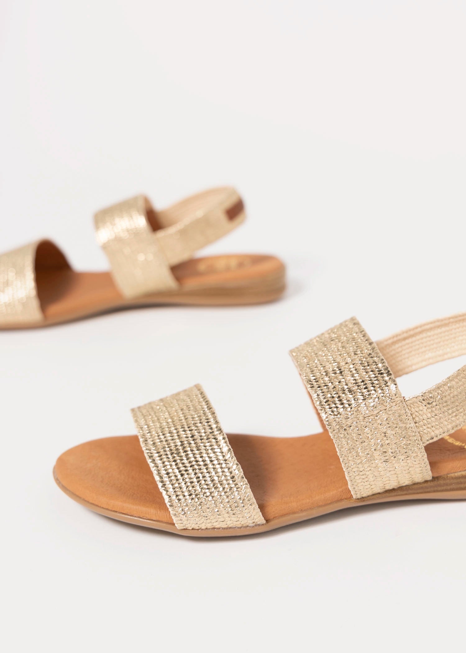 swatch_Platino andre assous nigella woven sandal