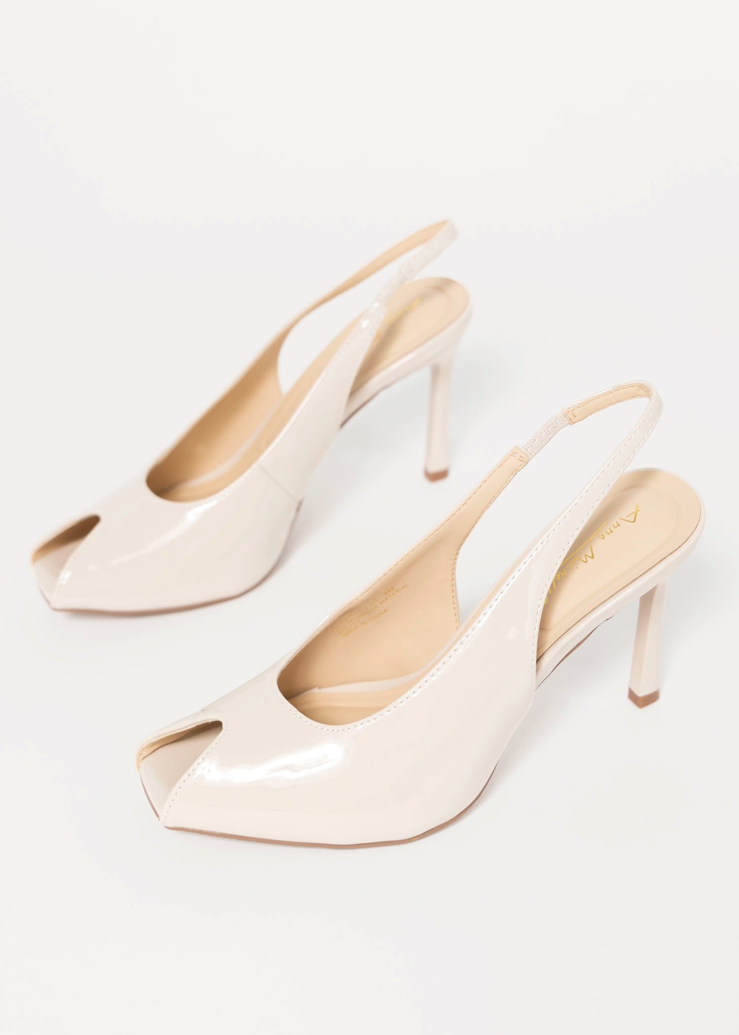 swatch_Ivory Patent clear cut peep toe slingback