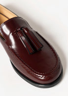 swatch_prune leather tassel loafer