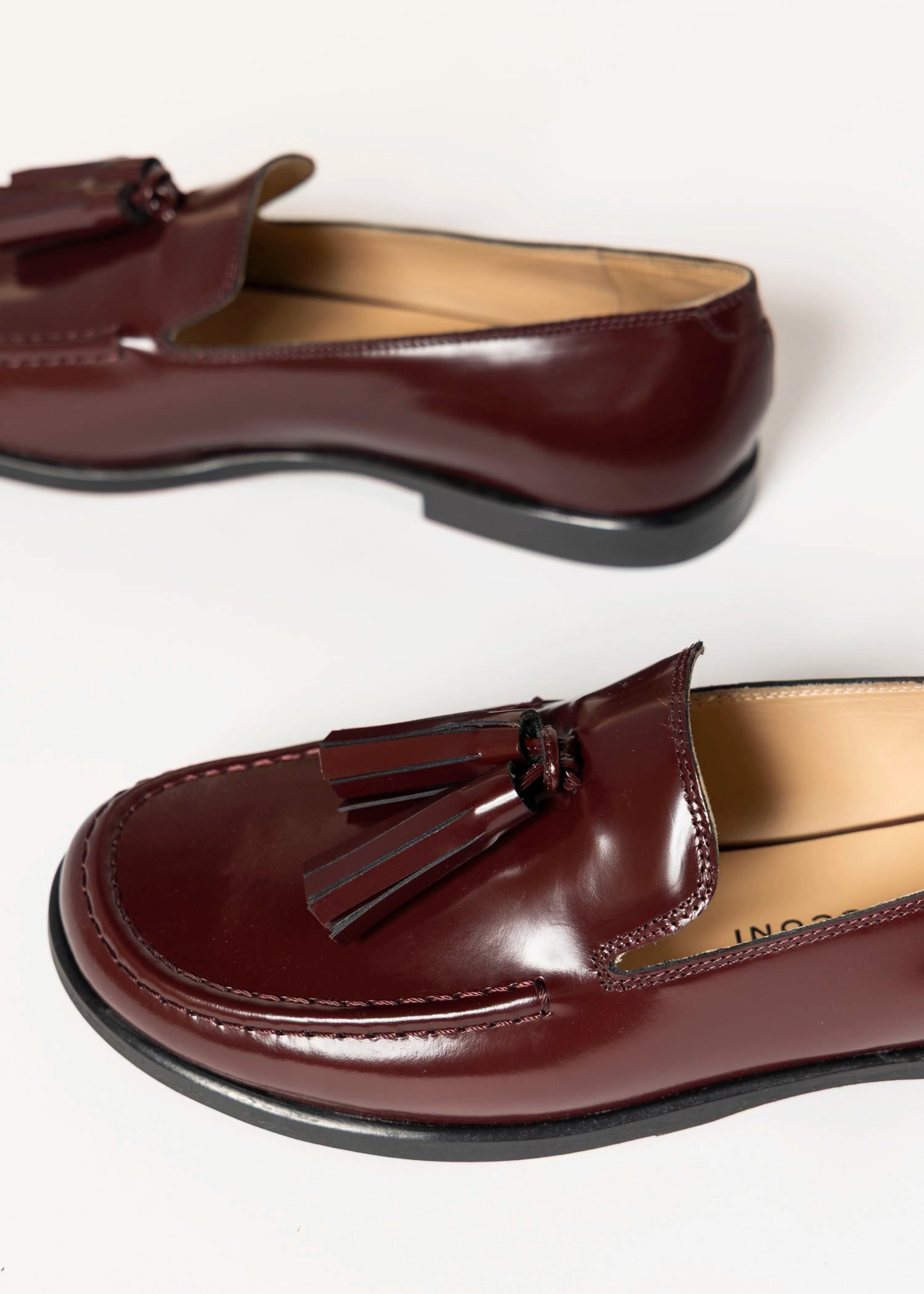 swatch_prune leather tassel loafer
