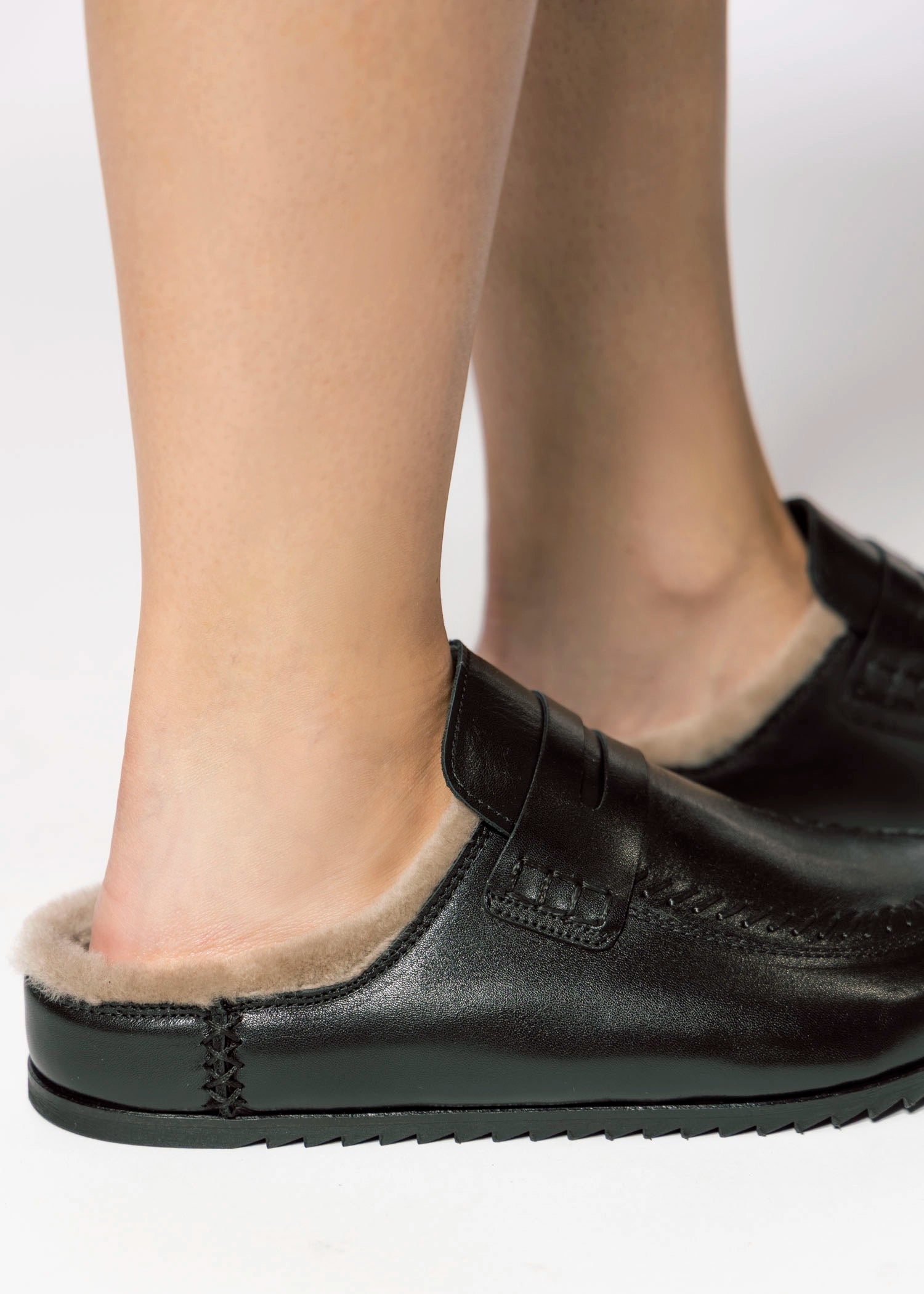 swatch_Black Leather shearling lined clog shoes