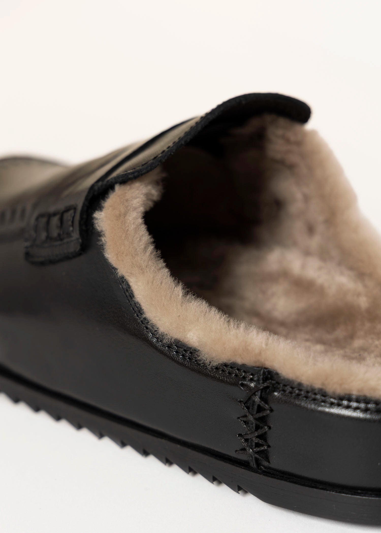 swatch_Black Leather shearling lined clog shoes