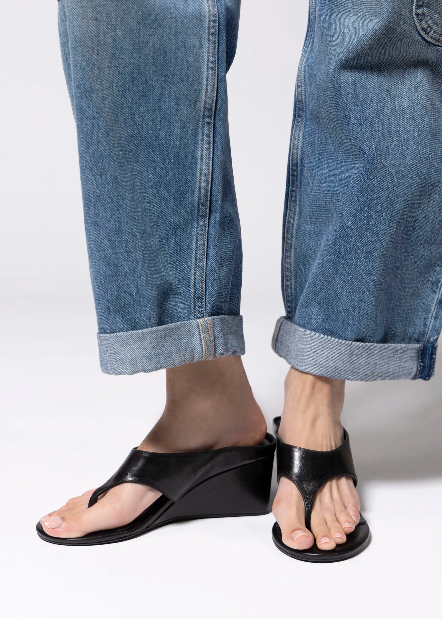 swatch_Black Leather tony bianco swift thong wedge sandal