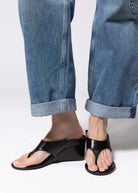 swatch_Black Leather tony bianco swift thong wedge sandal
