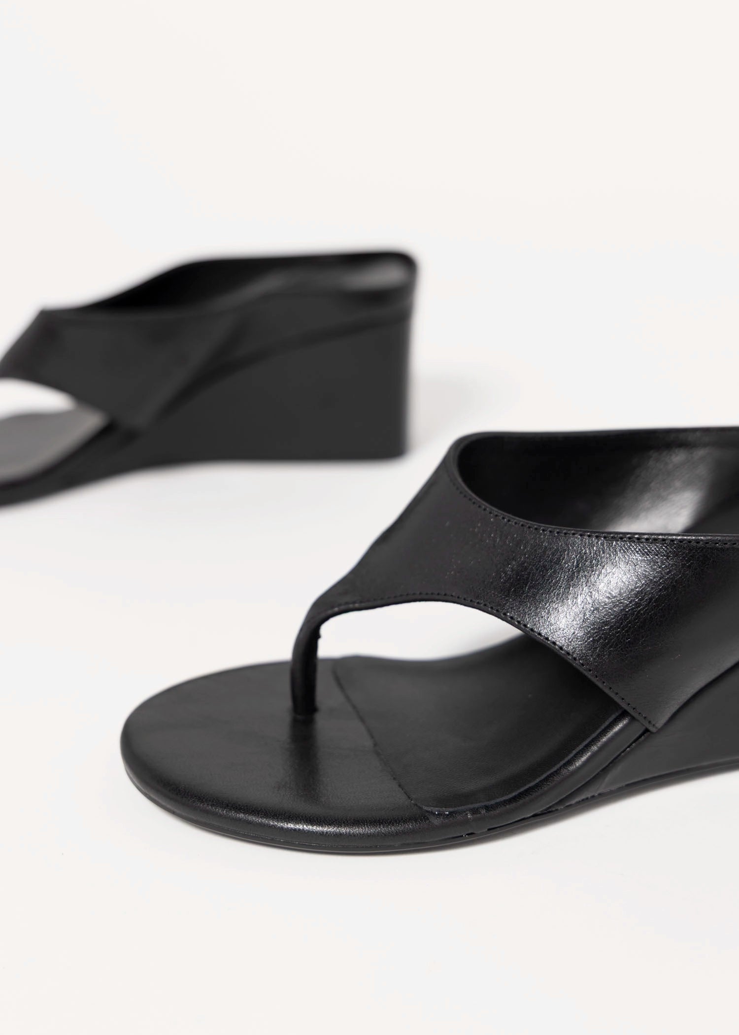 swatch_Black Leather tony bianco swift thong wedge sandal