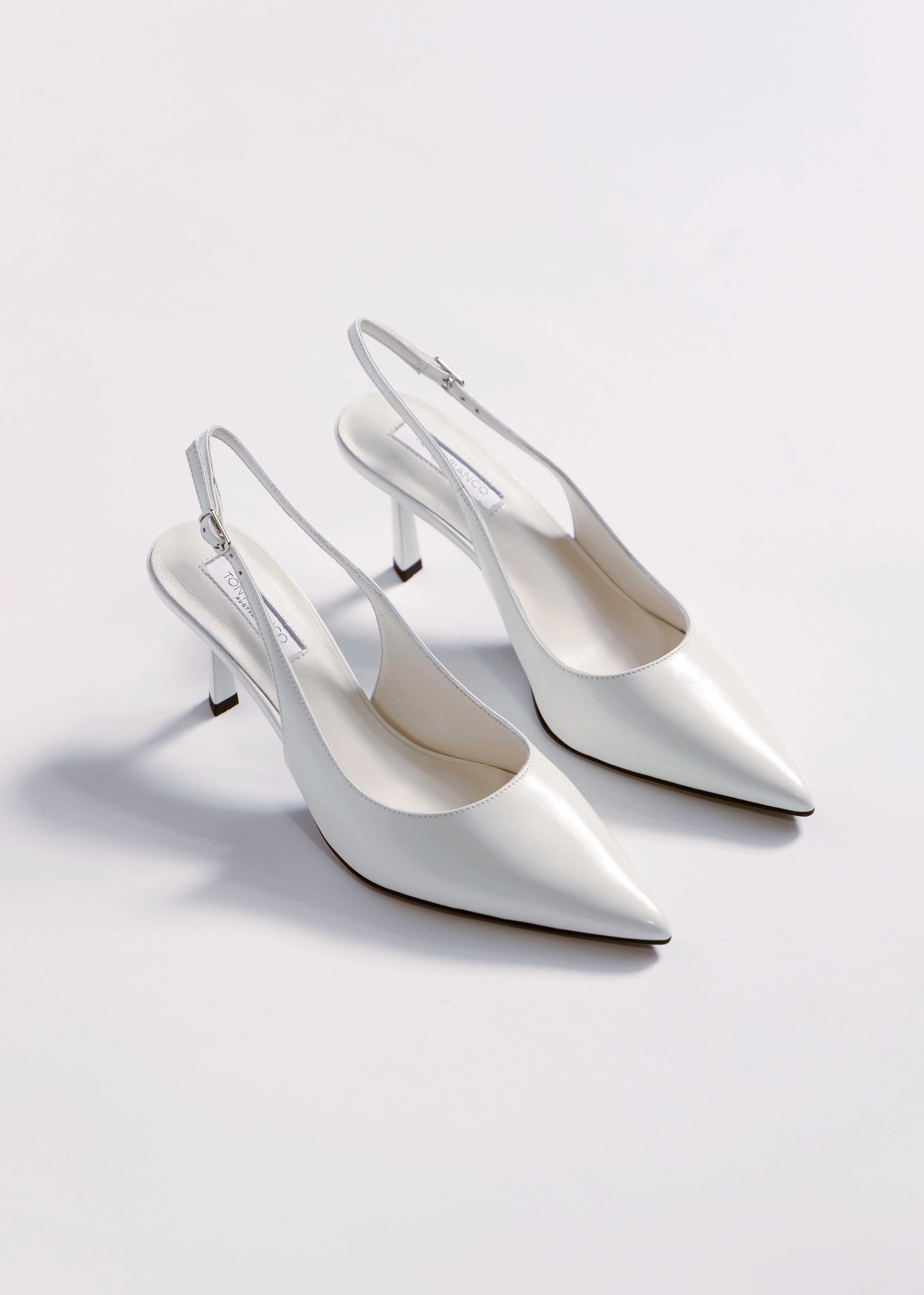 swatch_White Leather tony bianco baz slingback heel