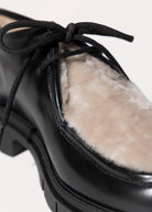 swatch_Black Leather shearling wallabe