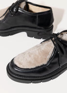 swatch_Black Leather shearling wallabe